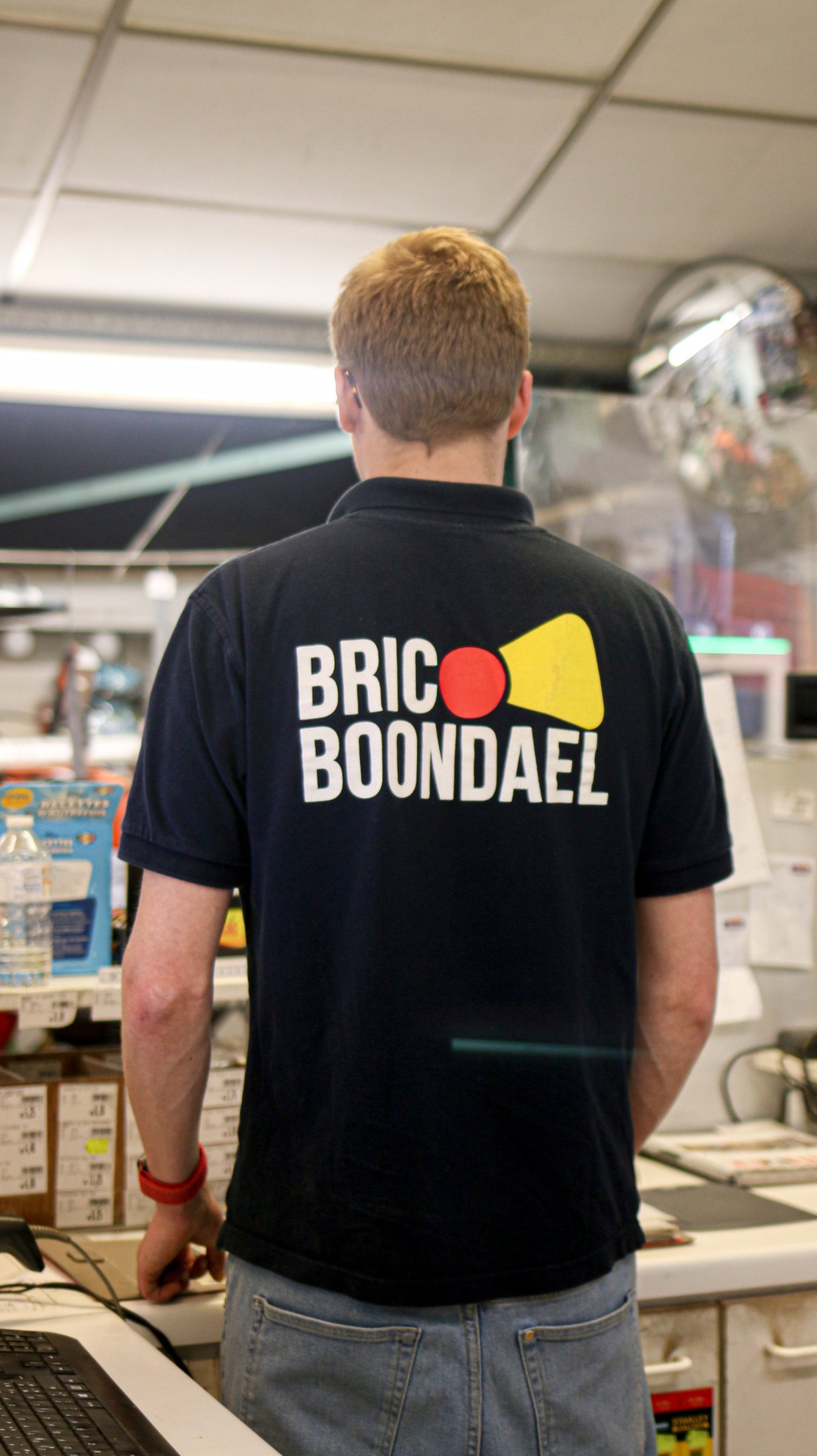 an abstract photo of a curved building with a blue sky in the background