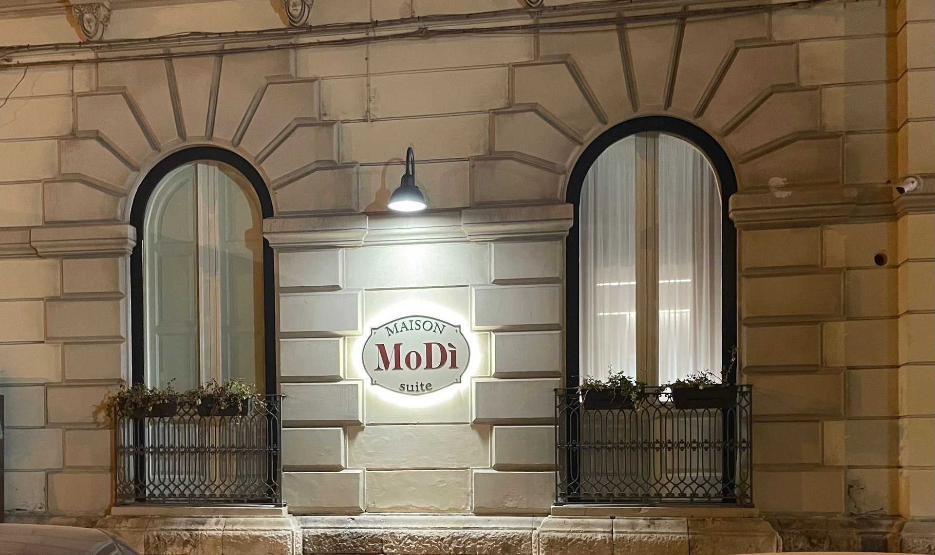 woman wearing yellow long-sleeved dress under white clouds and blue sky during daytime