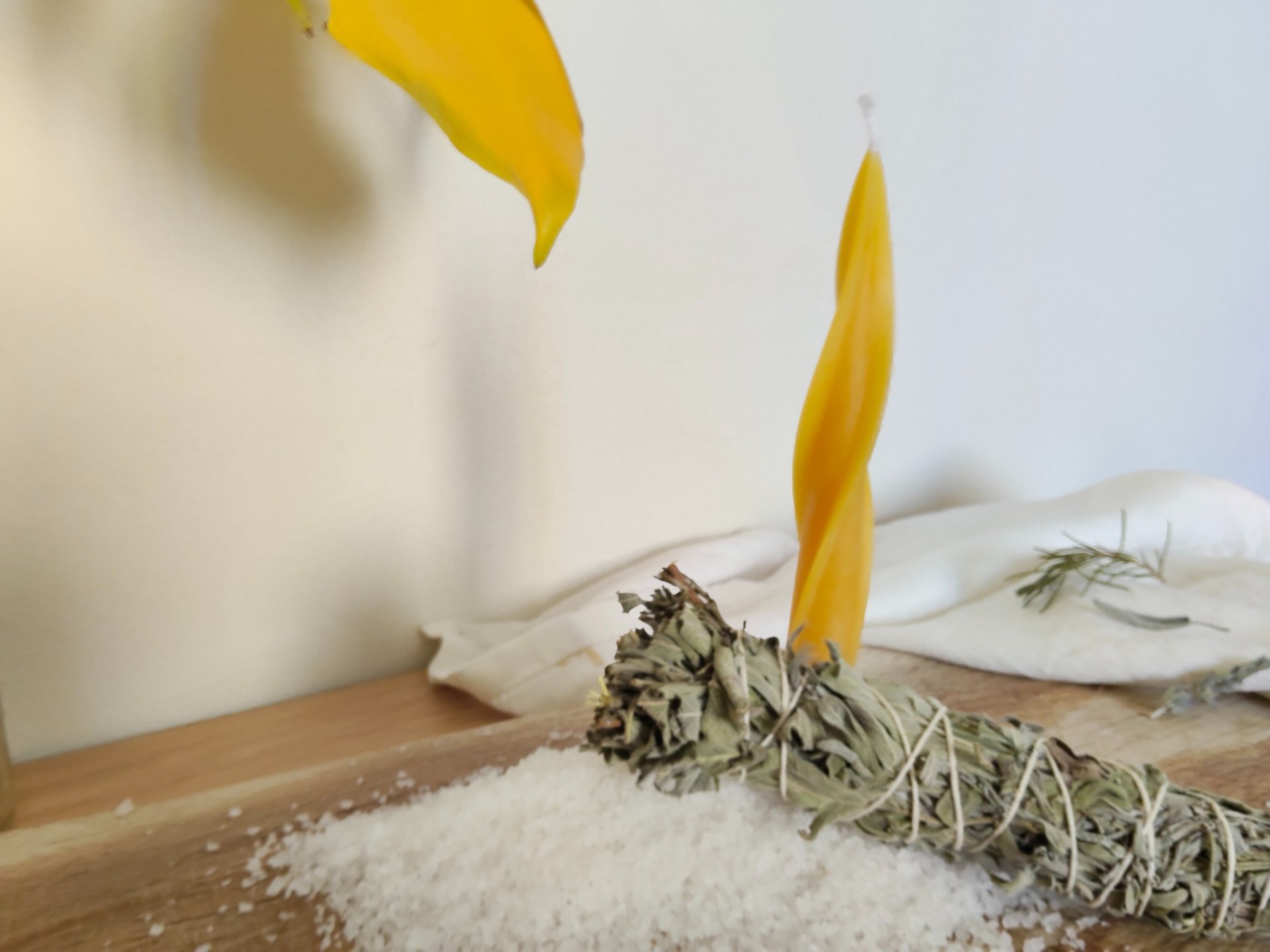 woman wearing yellow long-sleeved dress under white clouds and blue sky during daytime