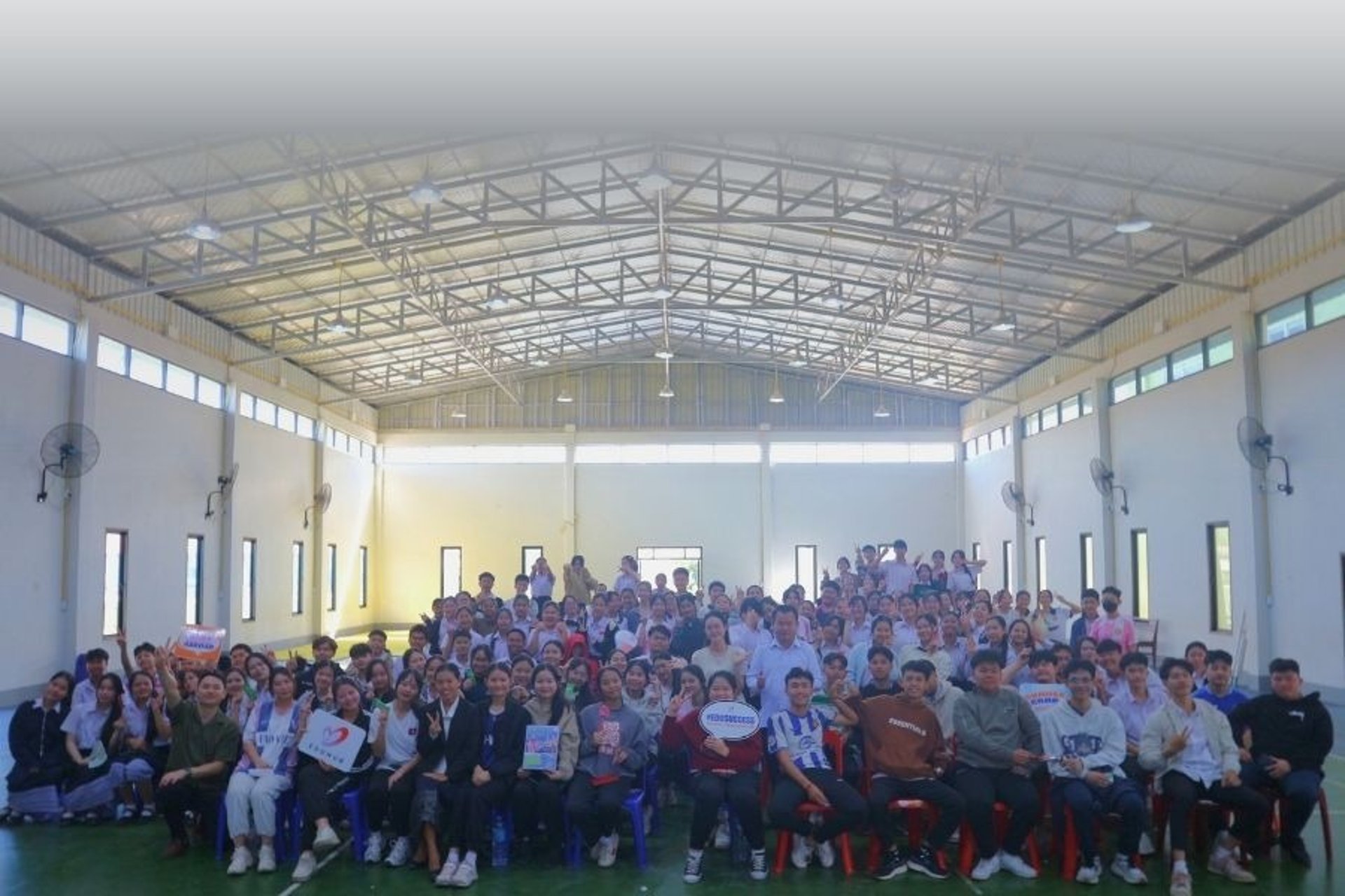 an abstract photo of a curved building with a blue sky in the background