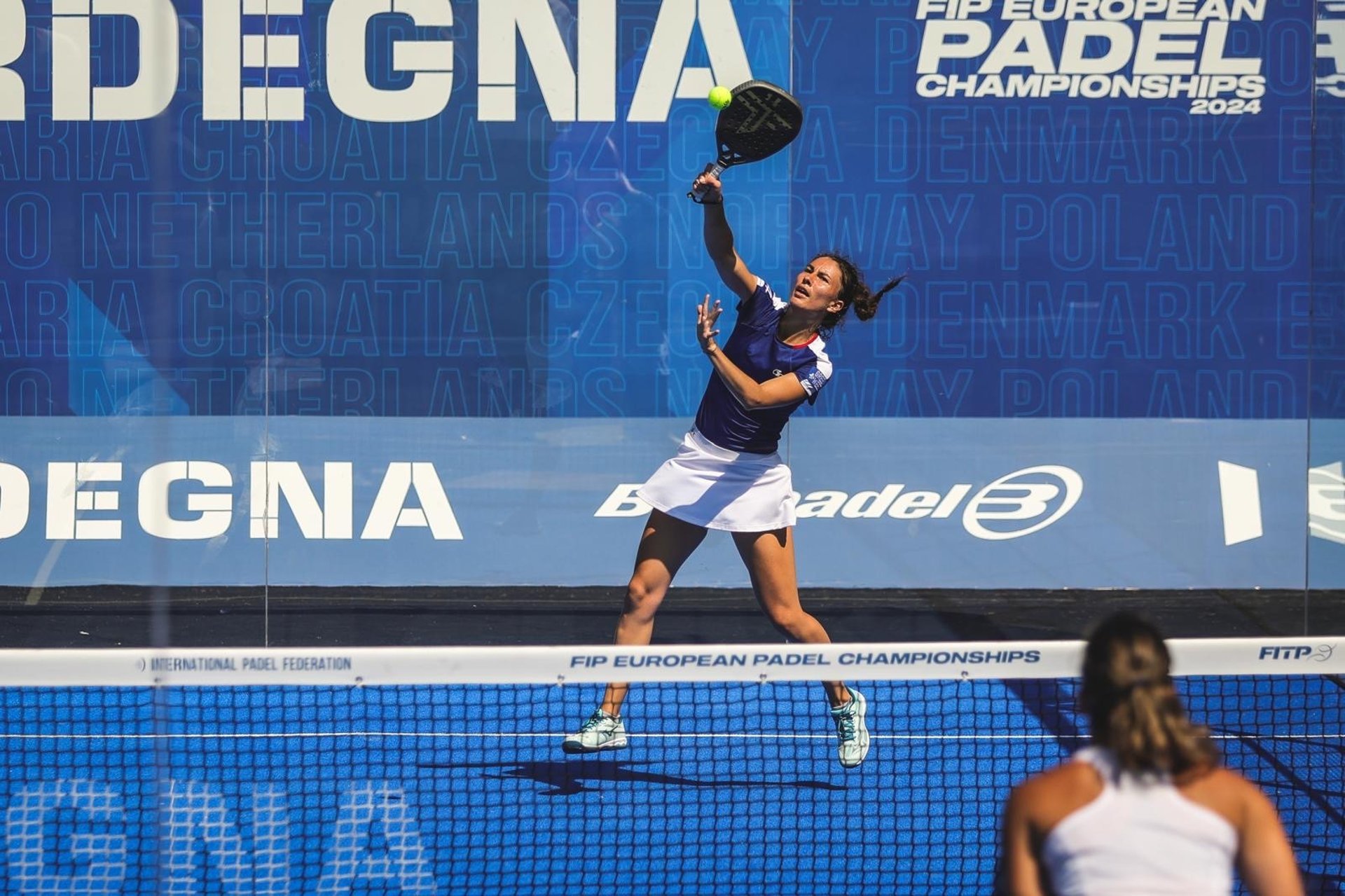 woman wearing yellow long-sleeved dress under white clouds and blue sky during daytime