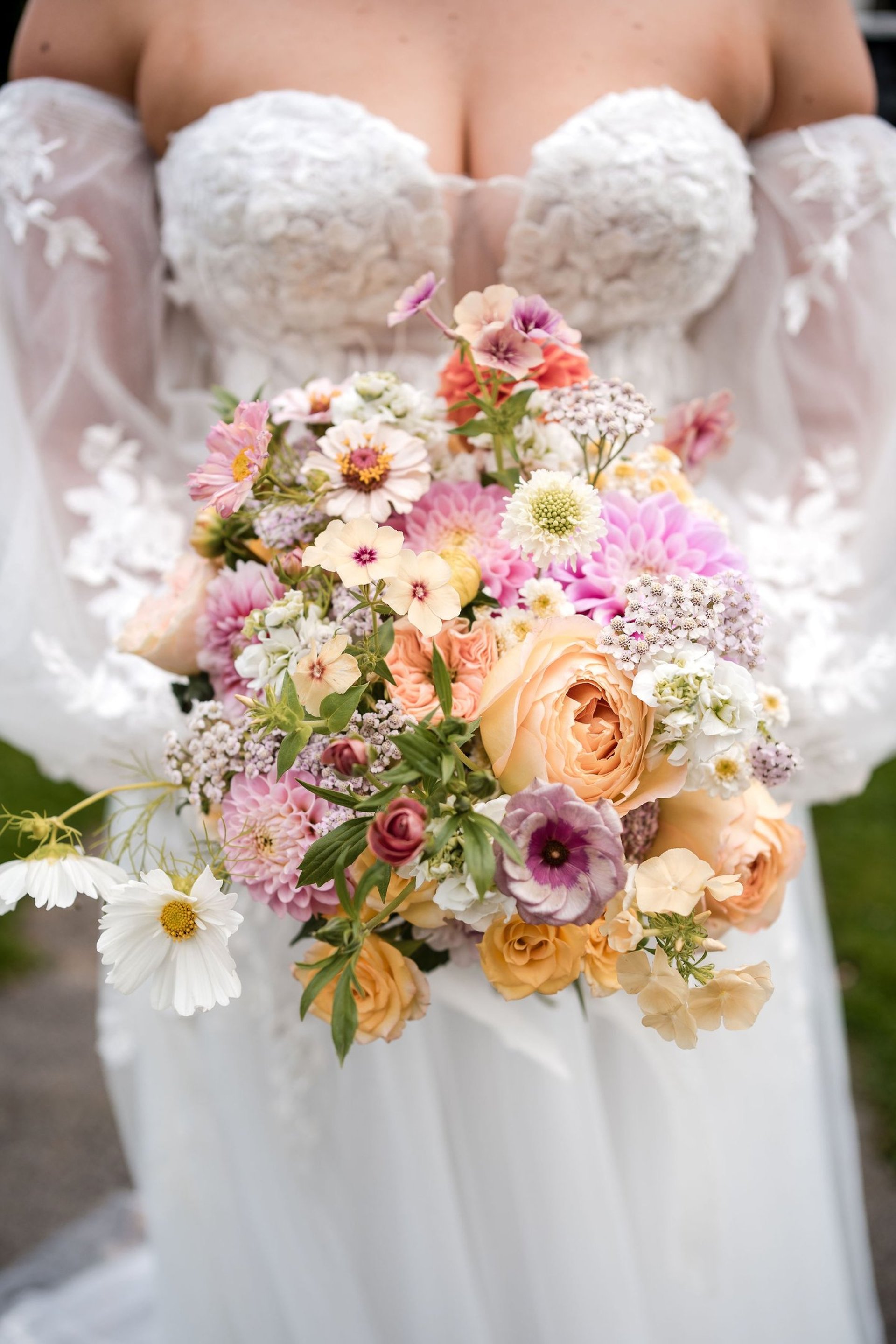 an abstract photo of a curved building with a blue sky in the background