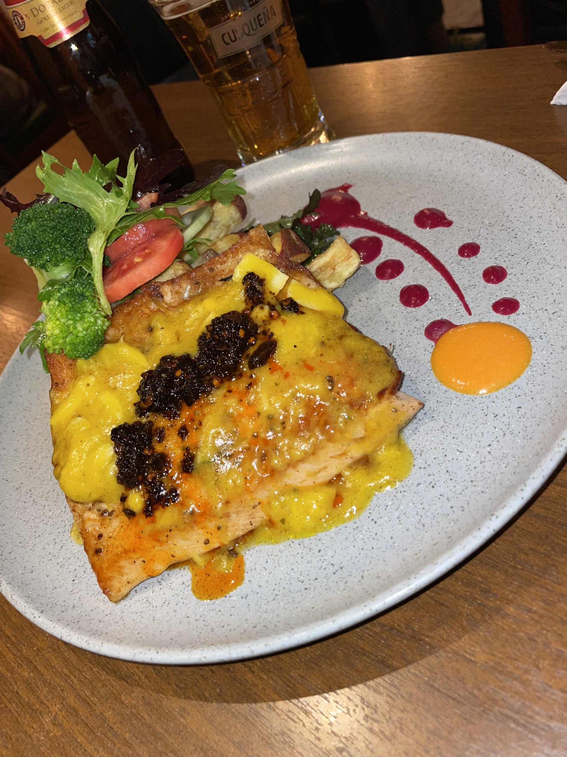 woman wearing yellow long-sleeved dress under white clouds and blue sky during daytime