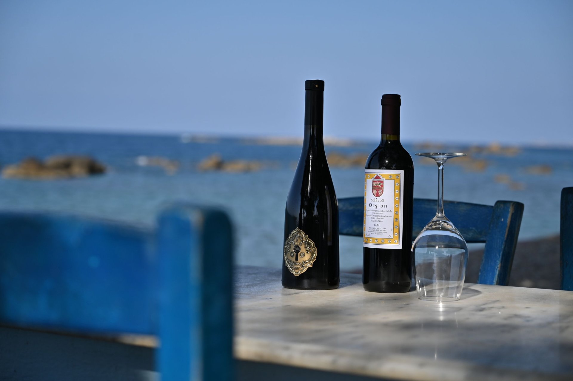 bottles of greek wines on a table at la canee