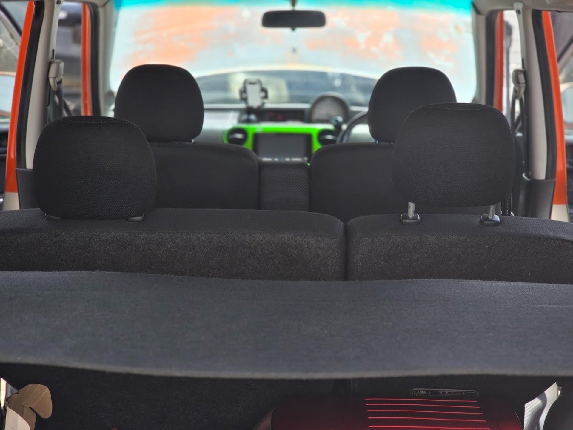 woman wearing yellow long-sleeved dress under white clouds and blue sky during daytime