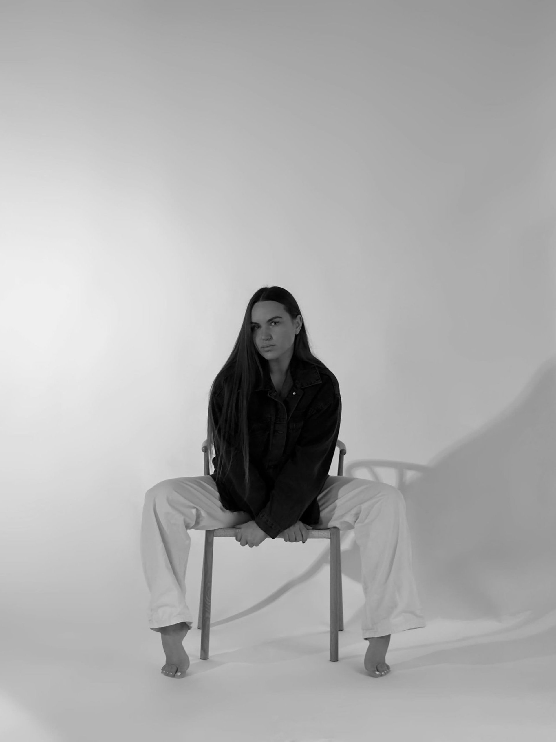 a close up of a black and brown abstract painting