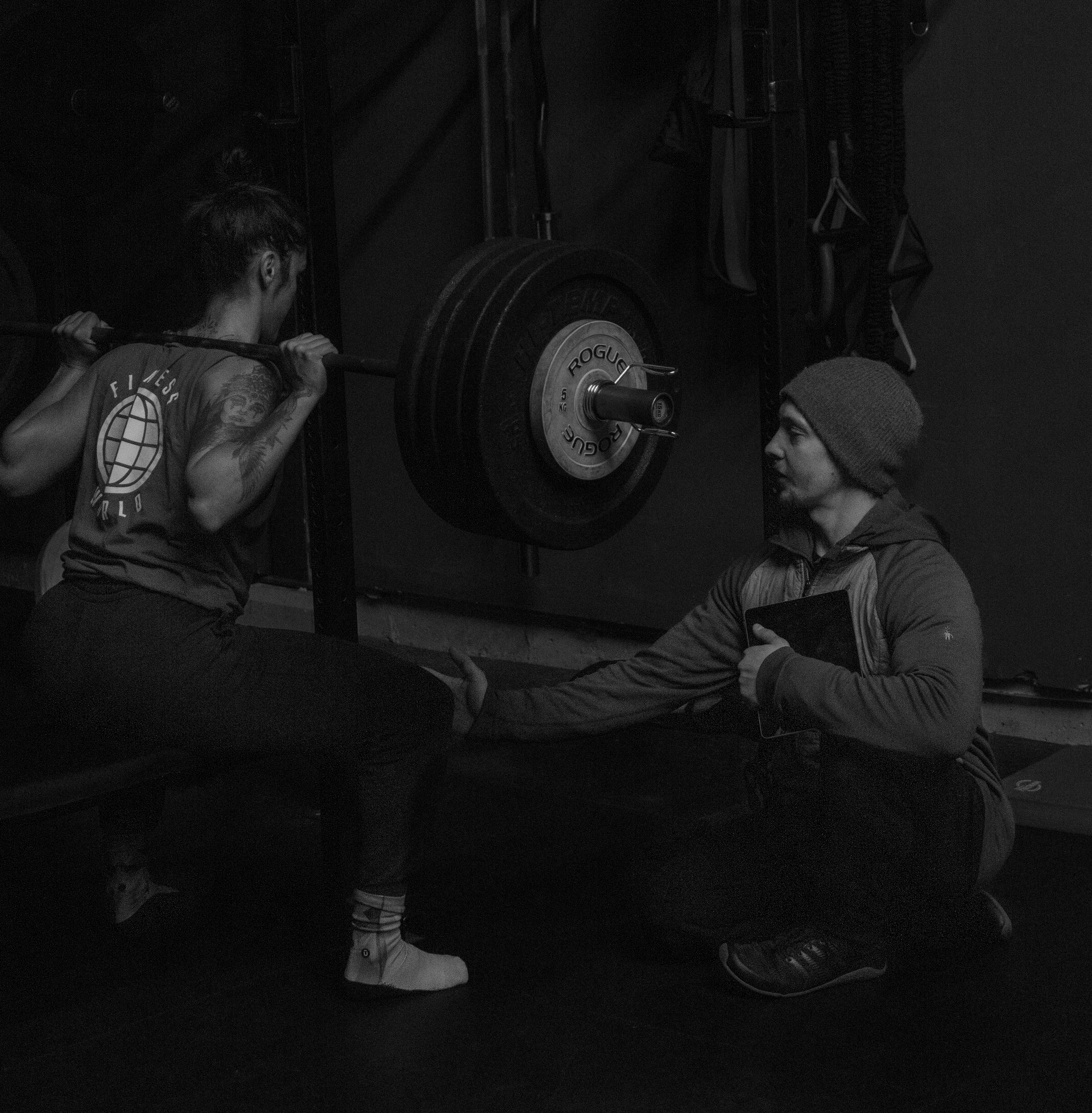 exercise equipments in grayscale photography