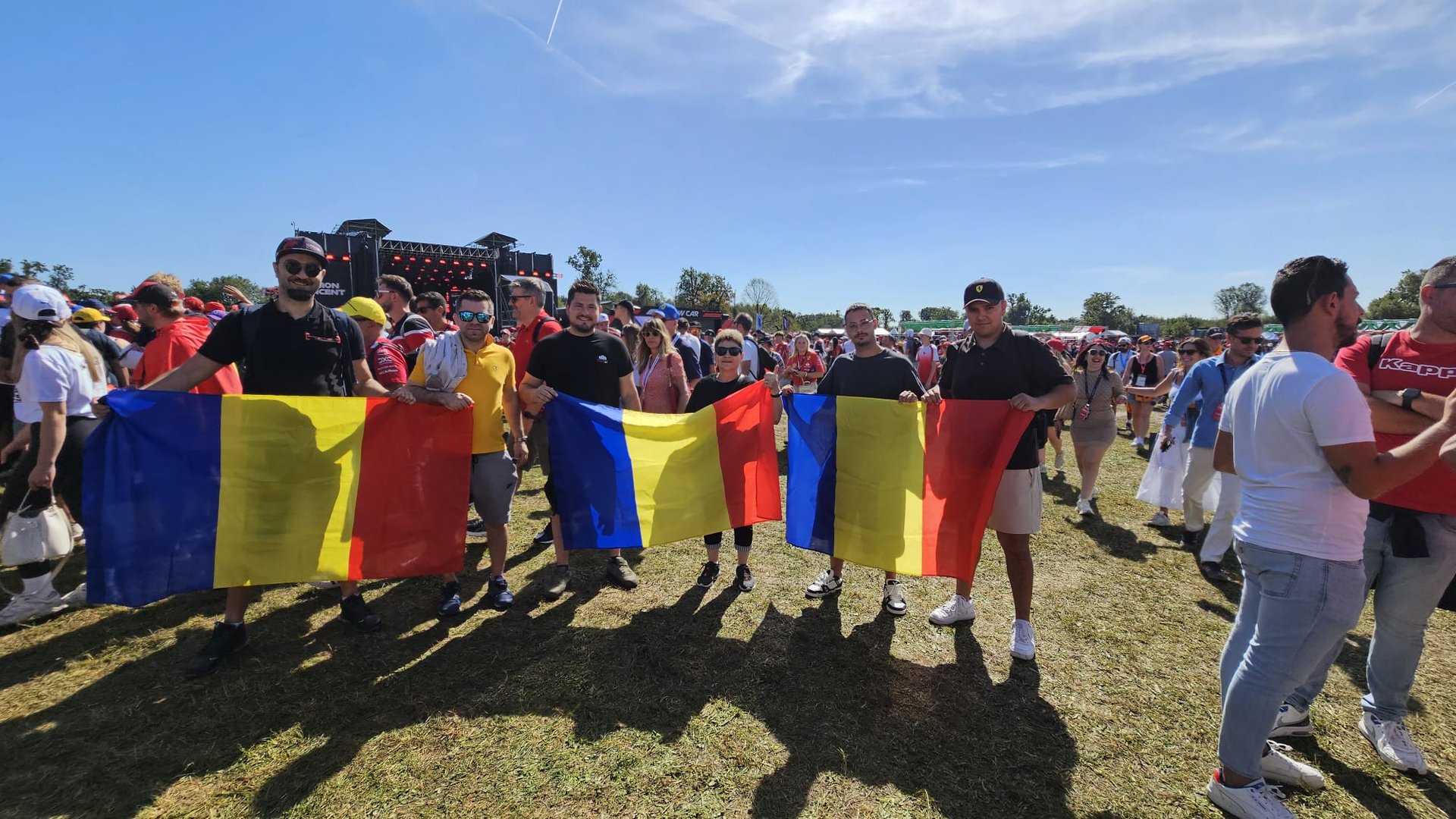 woman wearing yellow long-sleeved dress under white clouds and blue sky during daytime