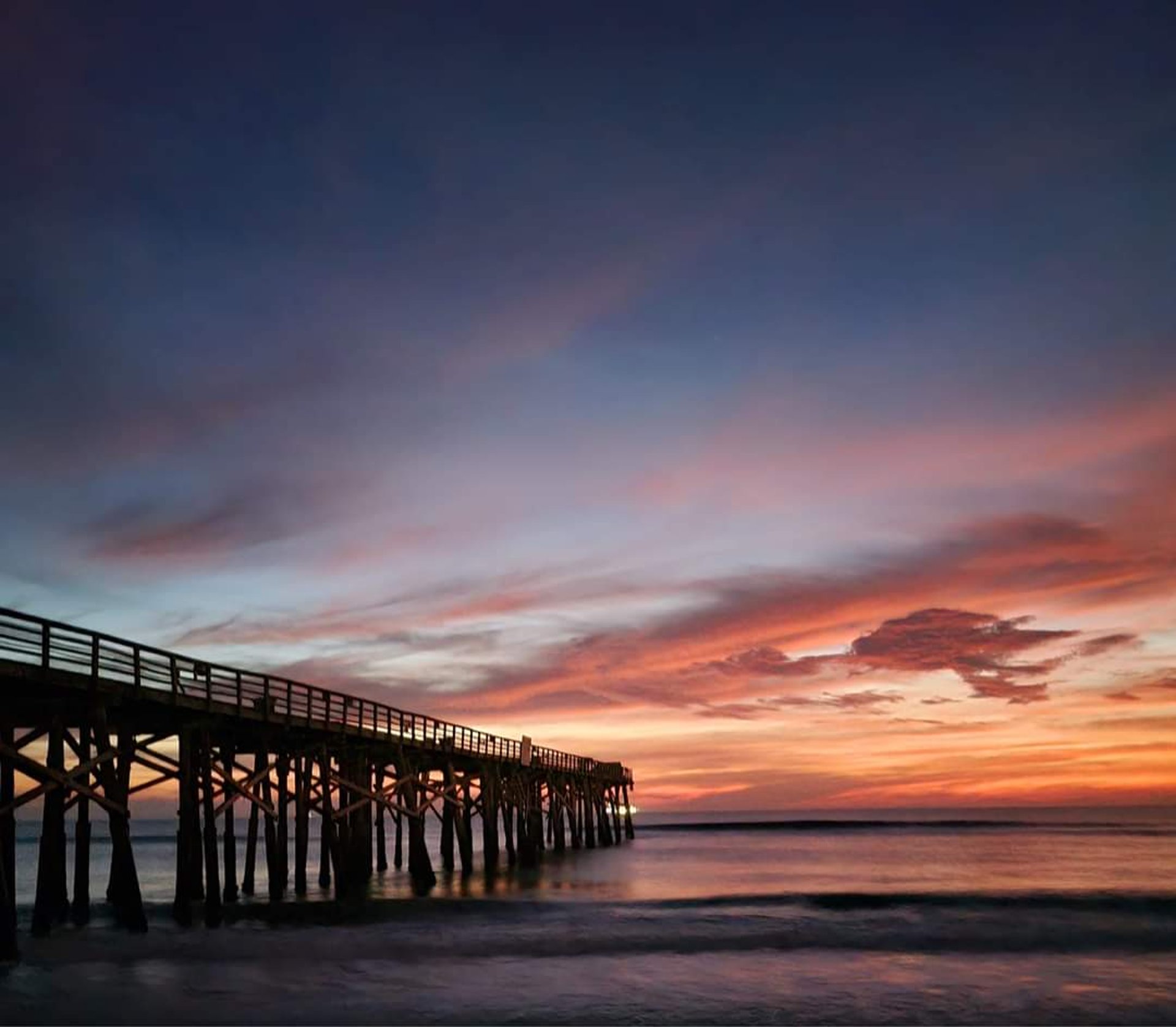 black and brown leather padded tub sofa