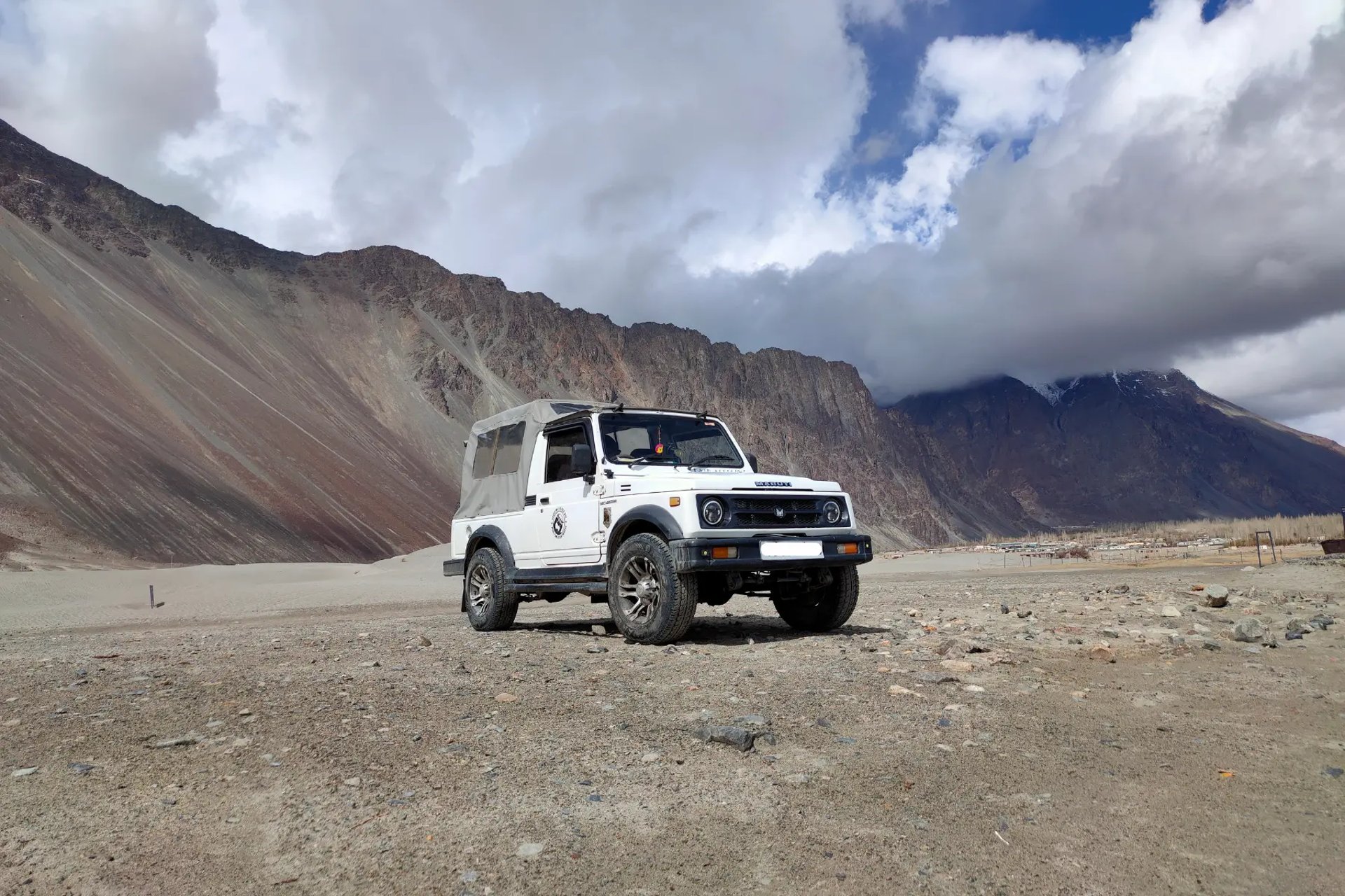 black and brown leather padded tub sofa