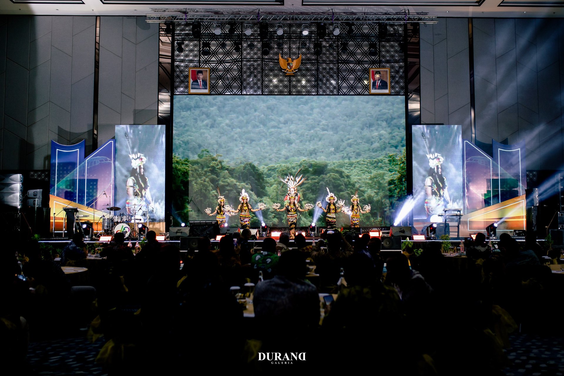 group of people watching concert