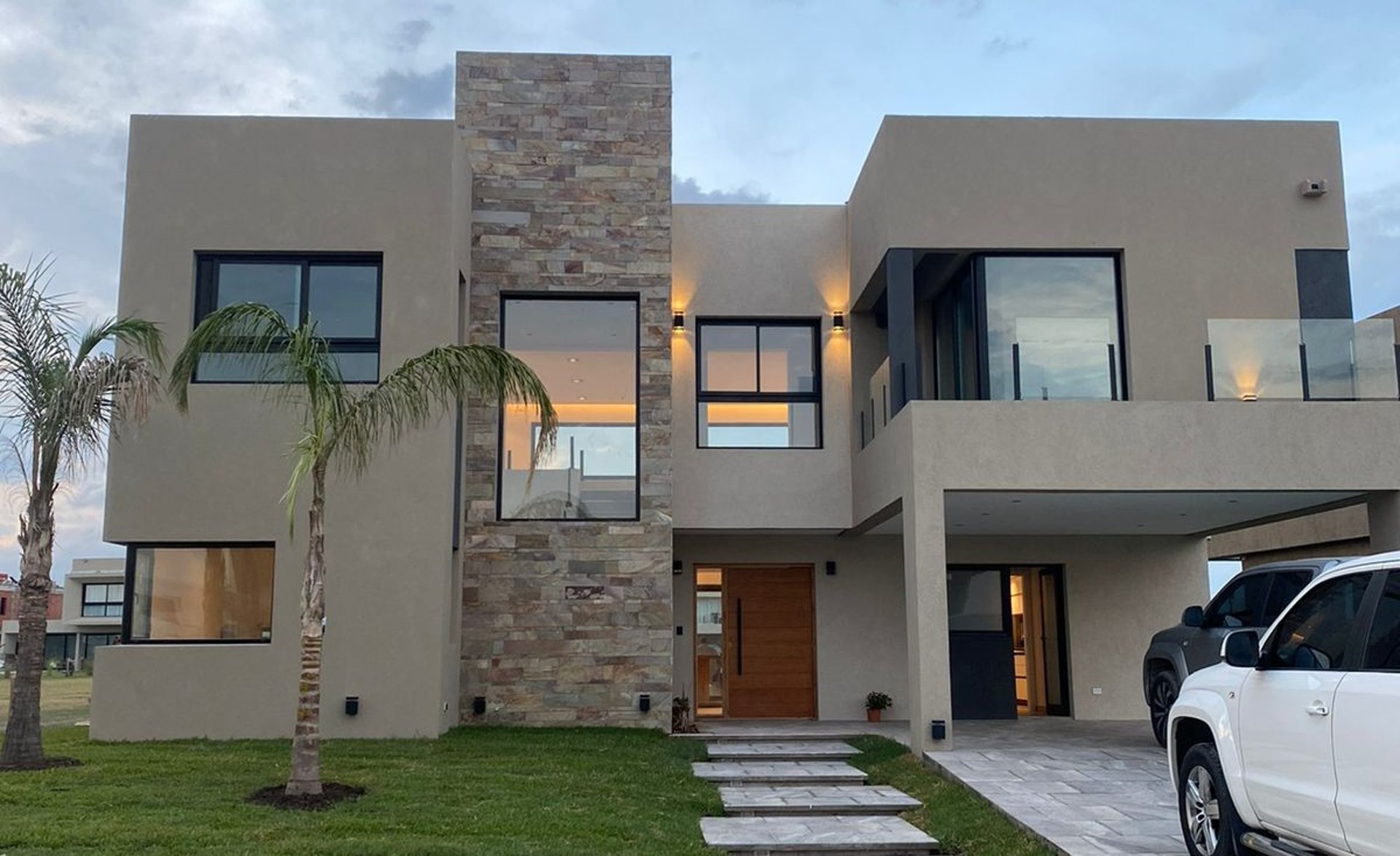 black and brown leather padded tub sofa
