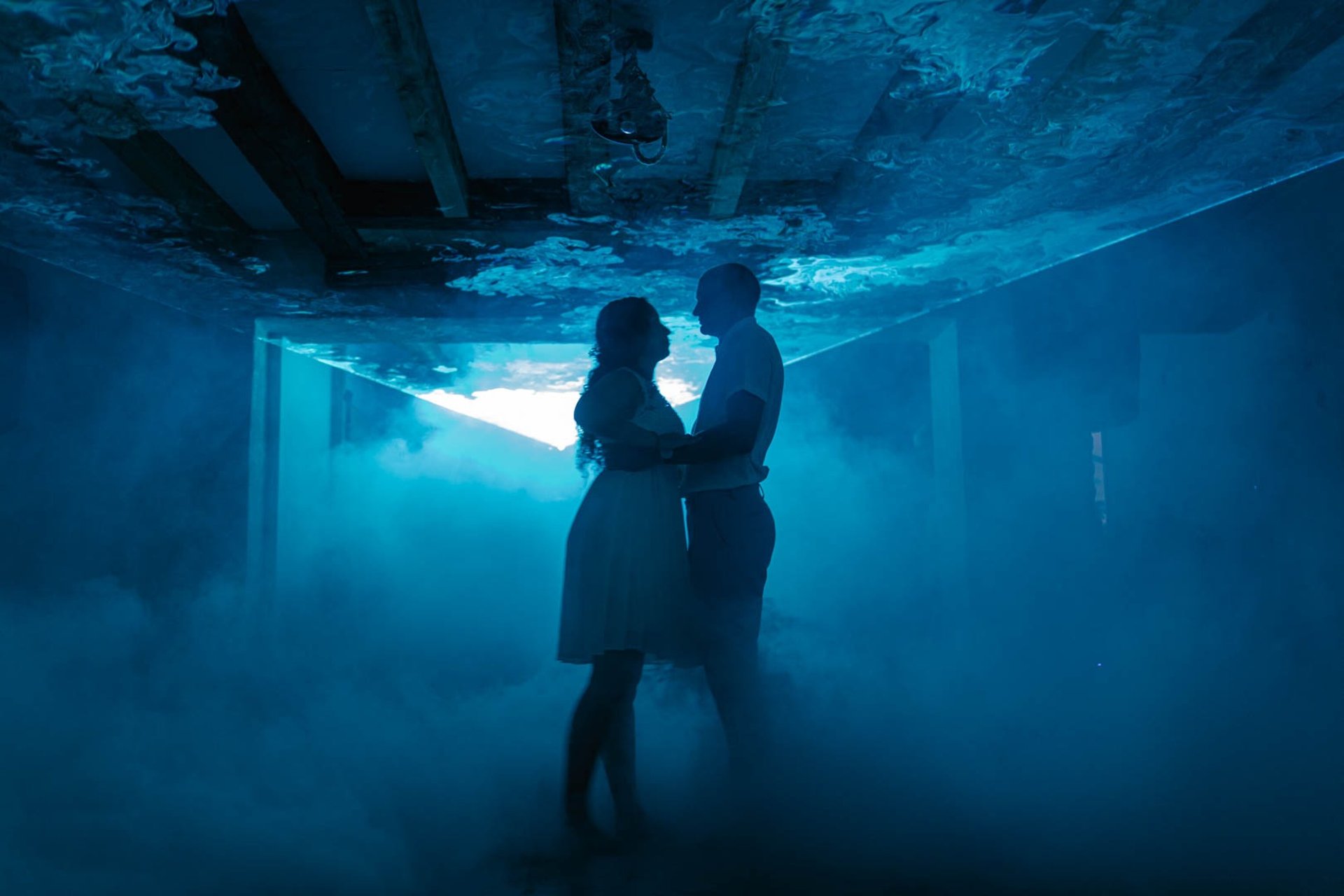 man and woman dancing wearing casual dresses