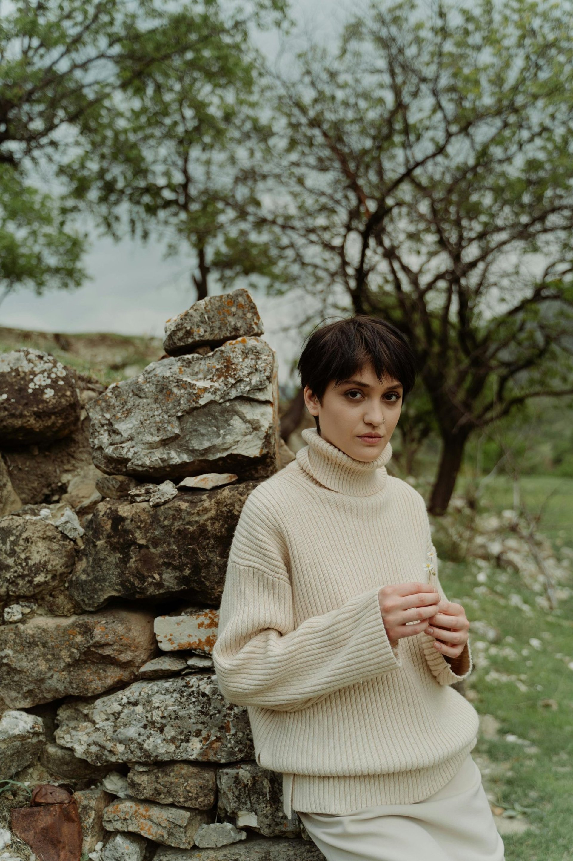 an abstract photo of a curved building with a blue sky in the background