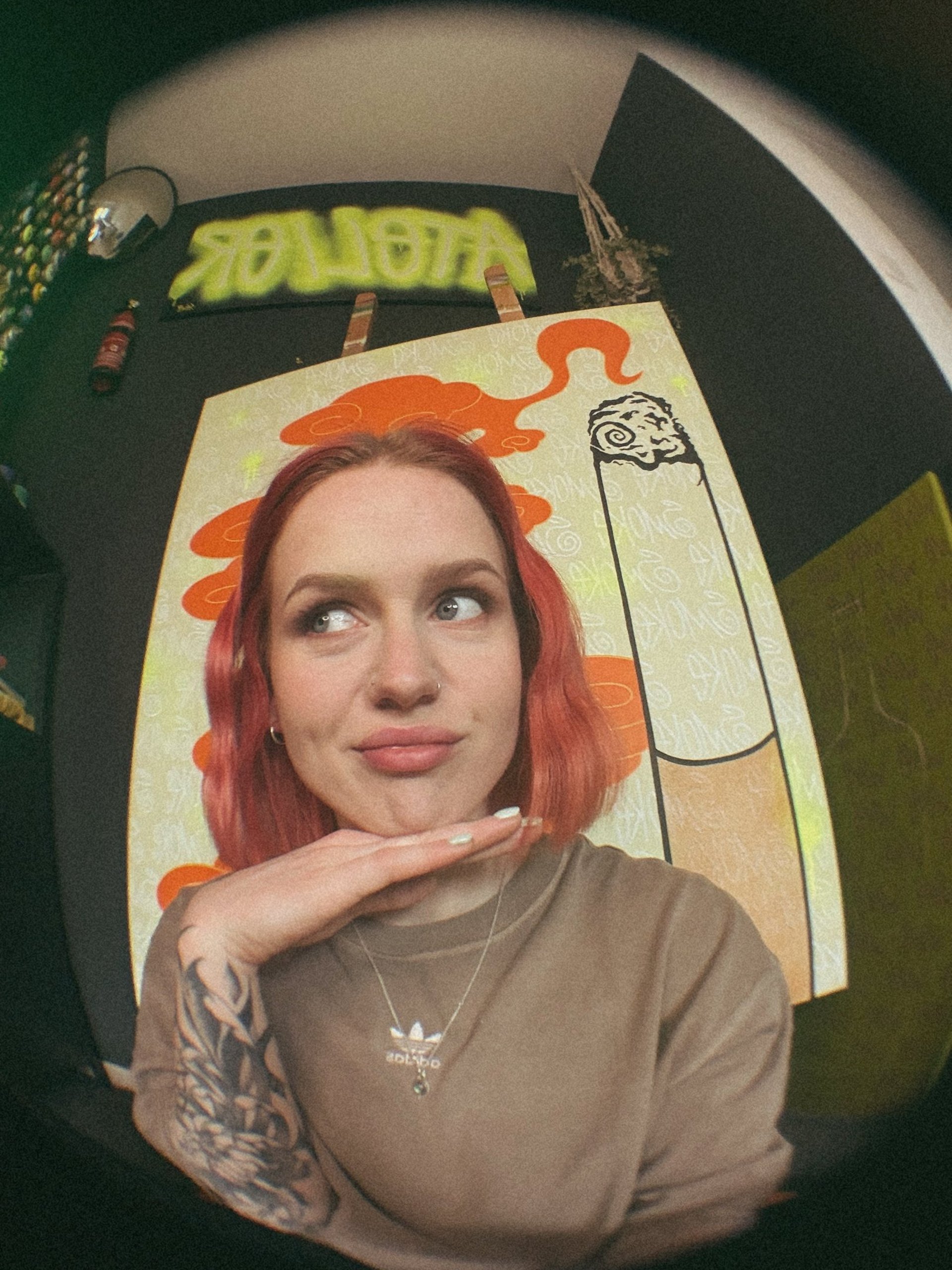 an abstract photo of a curved building with a blue sky in the background