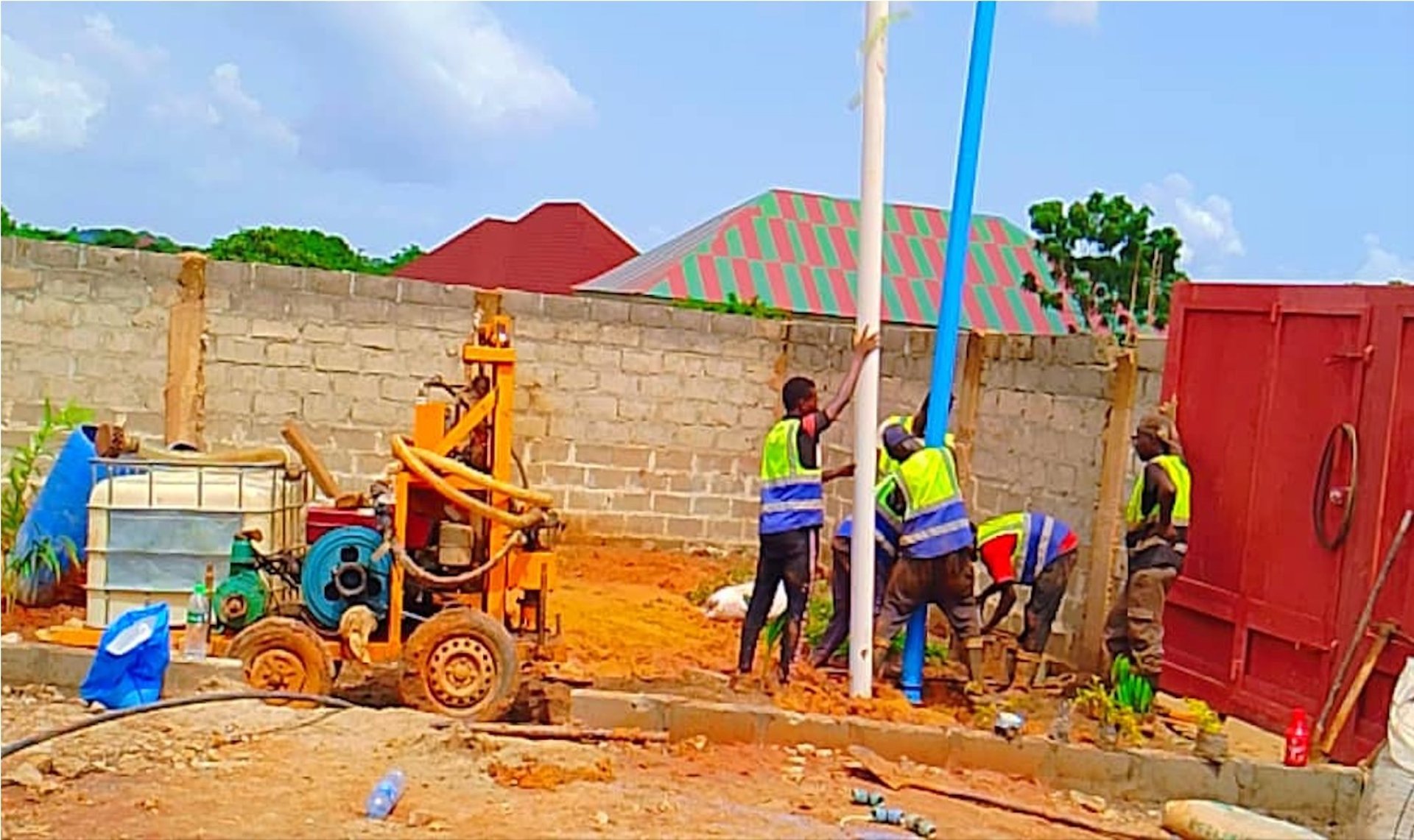 woman wearing yellow long-sleeved dress under white clouds and blue sky during daytime