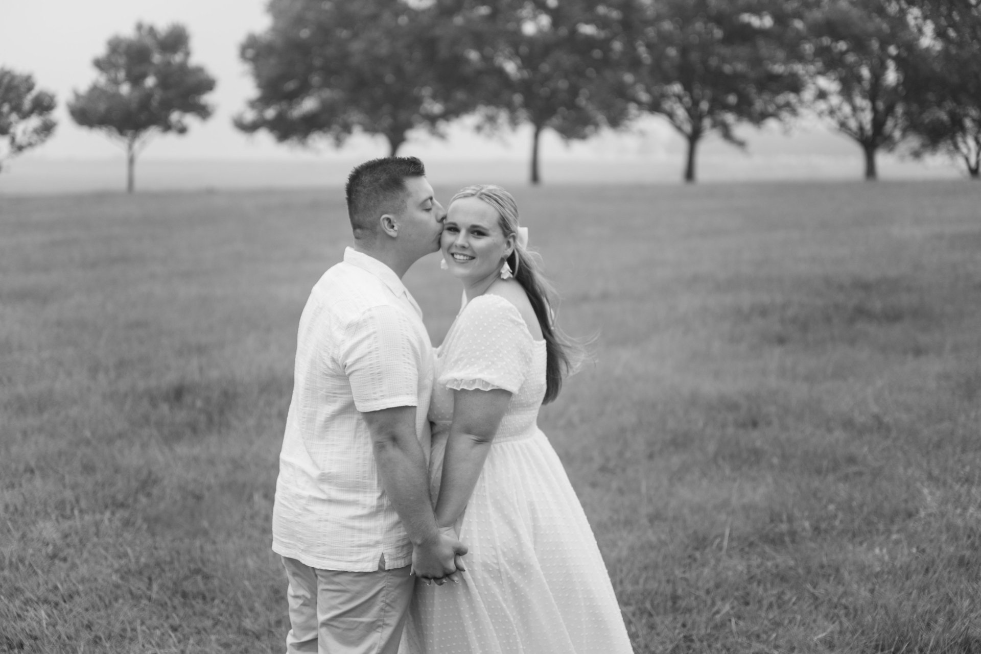 couple wearing silver-colored rings