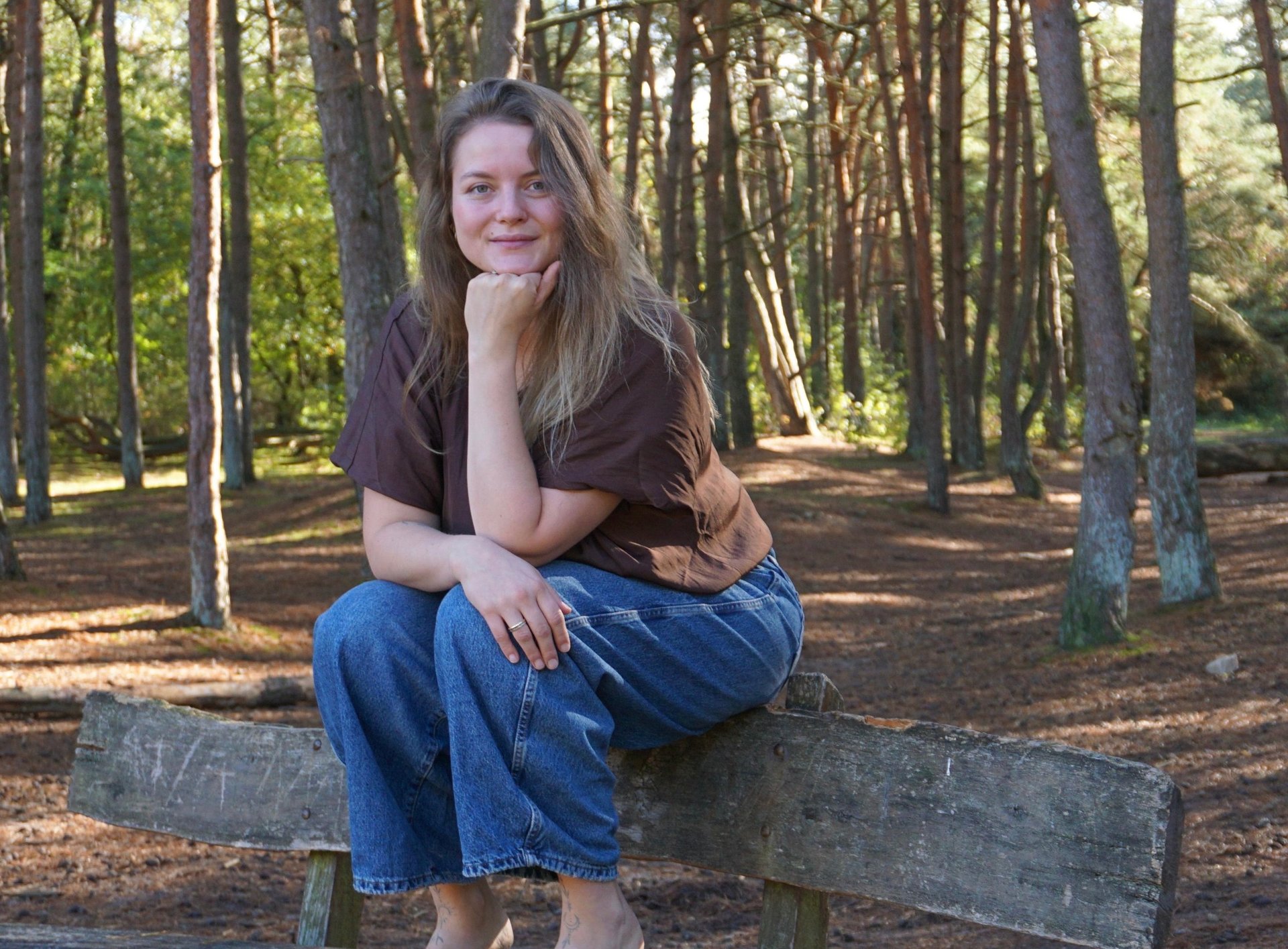 black and brown leather padded tub sofa