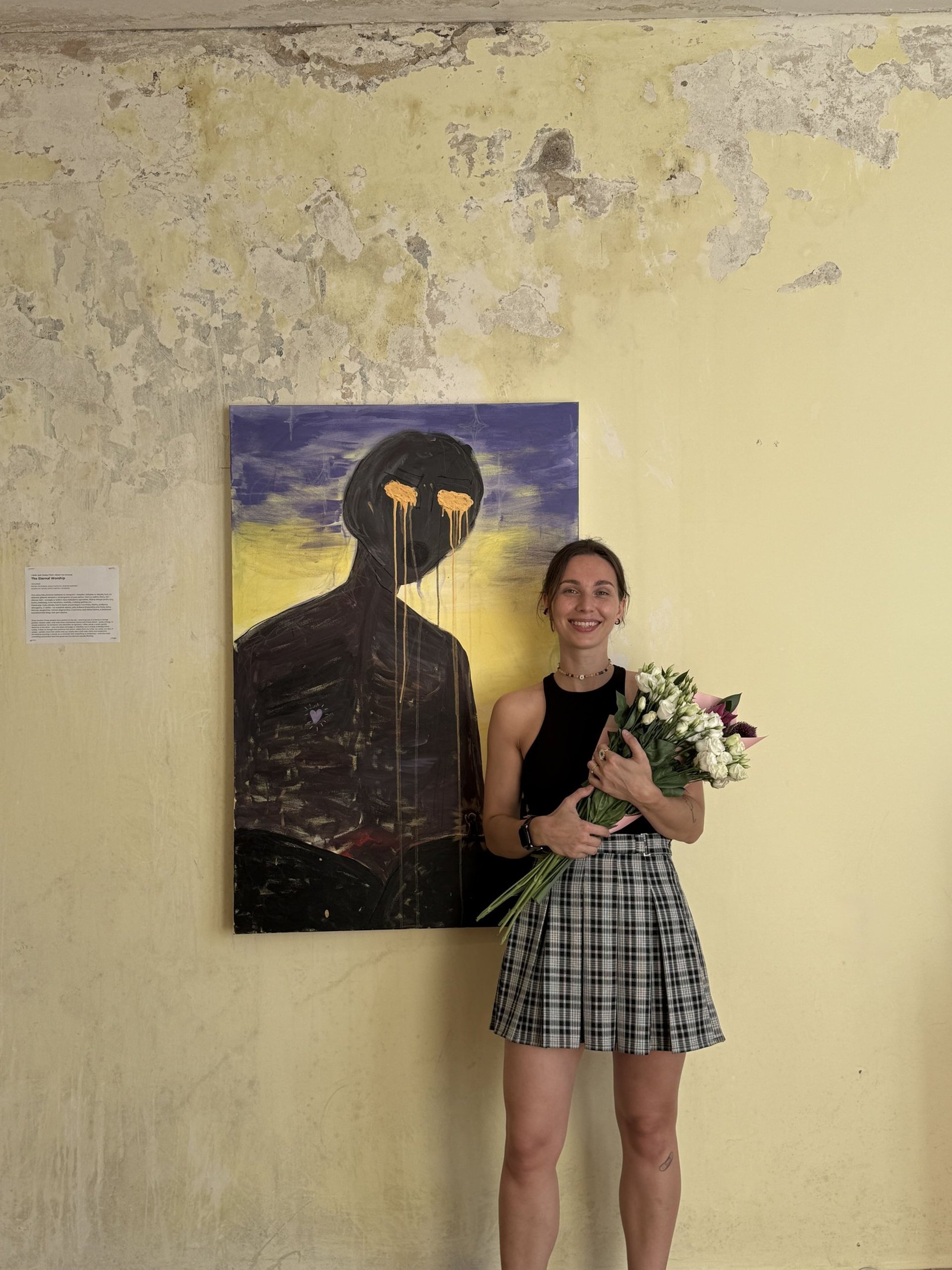 an abstract photo of a curved building with a blue sky in the background
