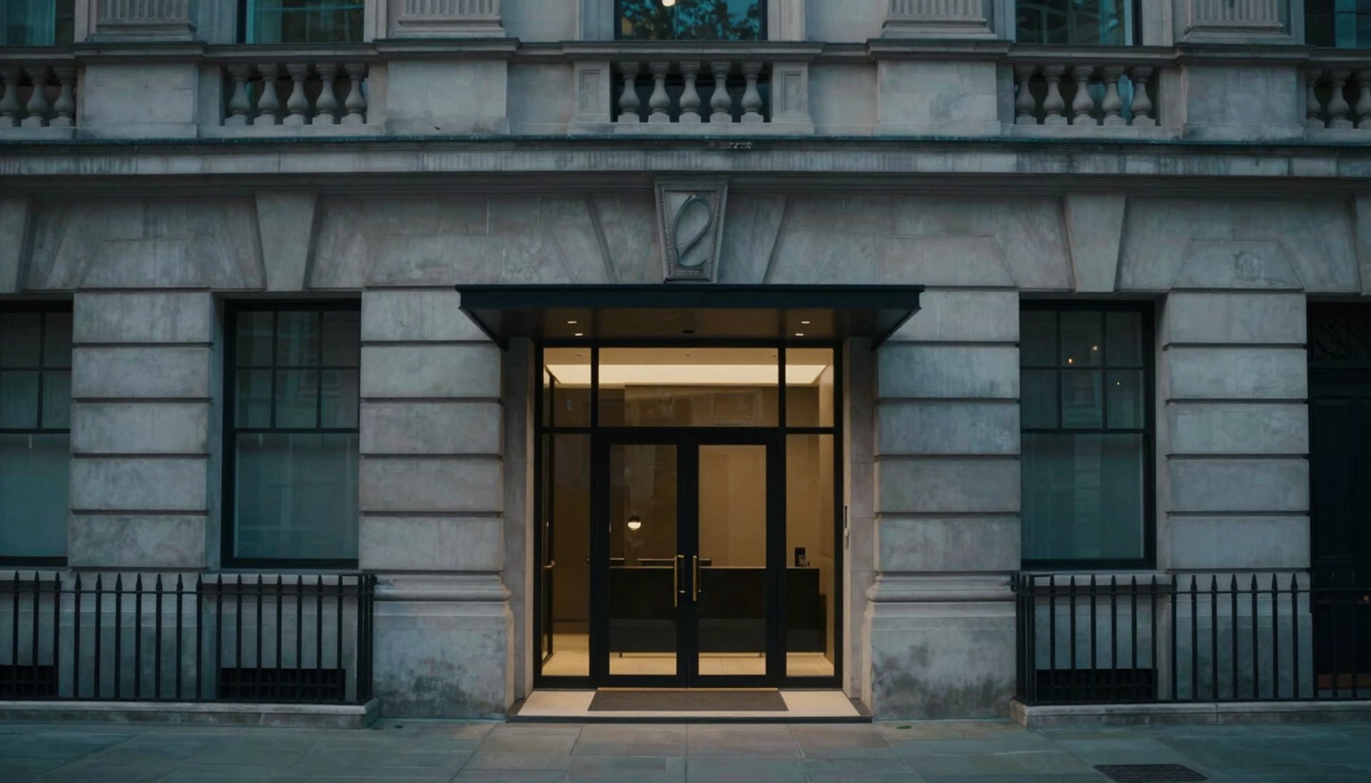 an abstract photo of a curved building with a blue sky in the background