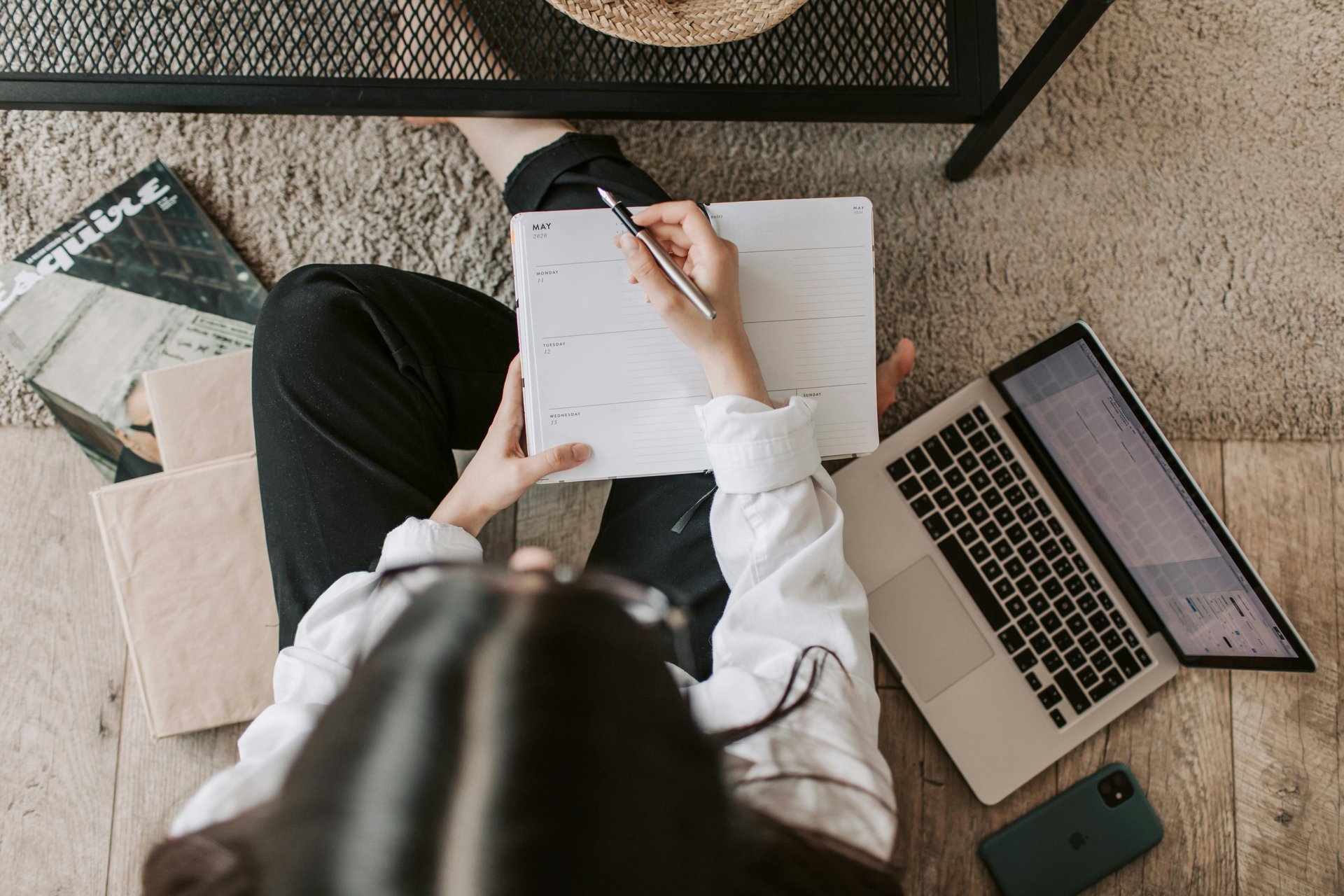woman in front of laptop computer editing photo