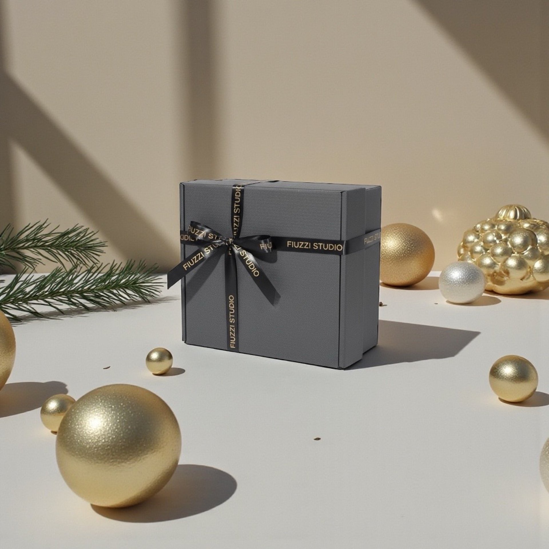 a white box with a red bow on top of it