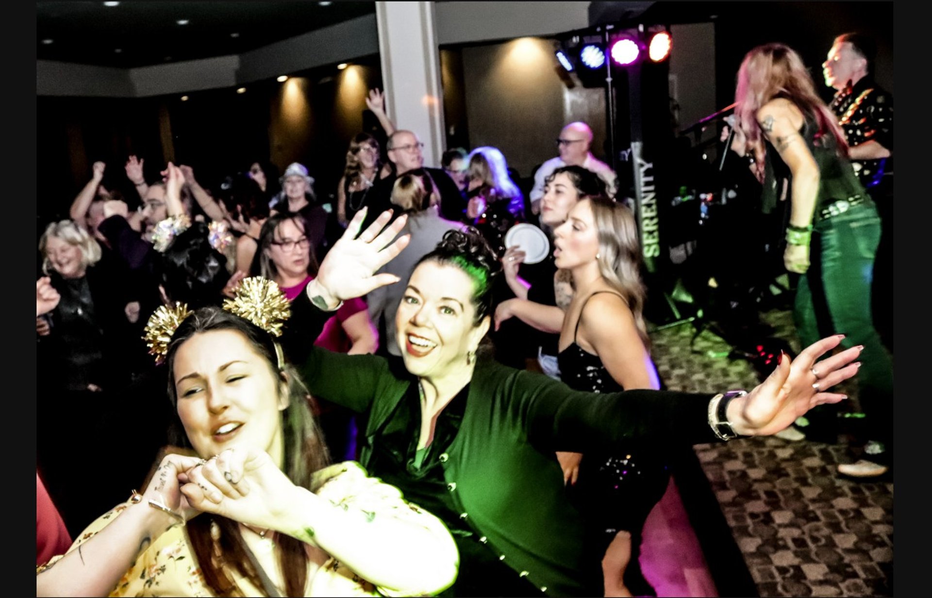 a large fireworks display with a castle in the background