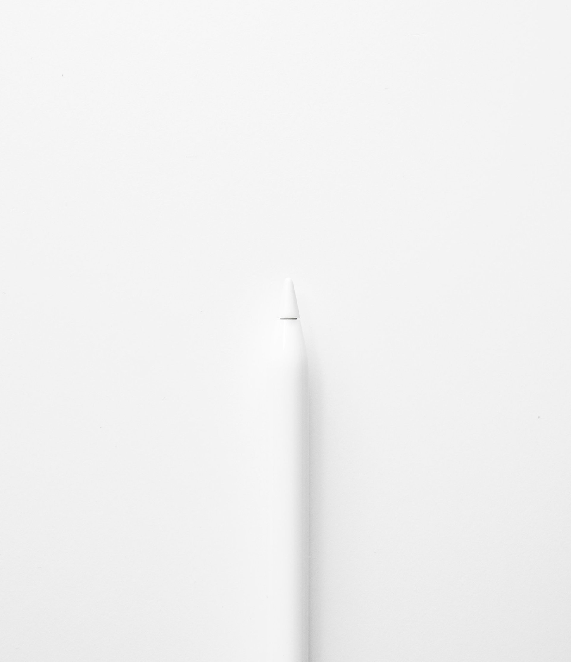 a white toothbrush on a white surface
