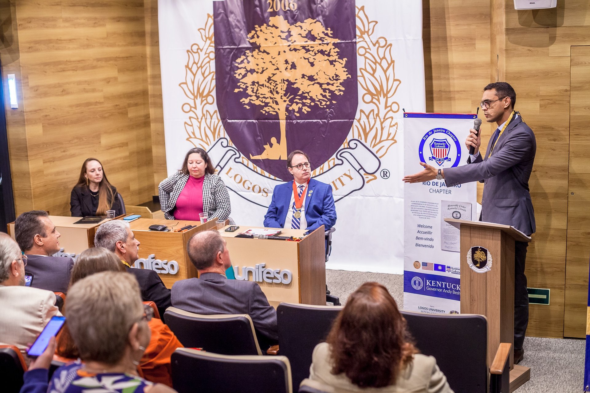 a group of women walking down a sidewalk next to bicycles