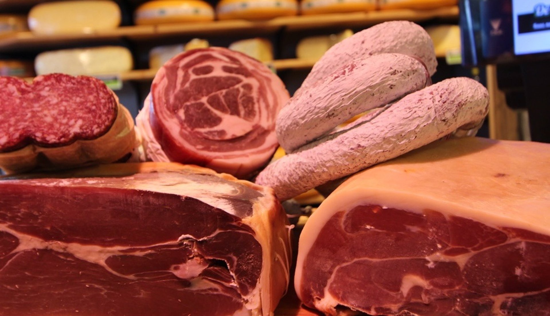 sliced meat on brown wooden chopping board