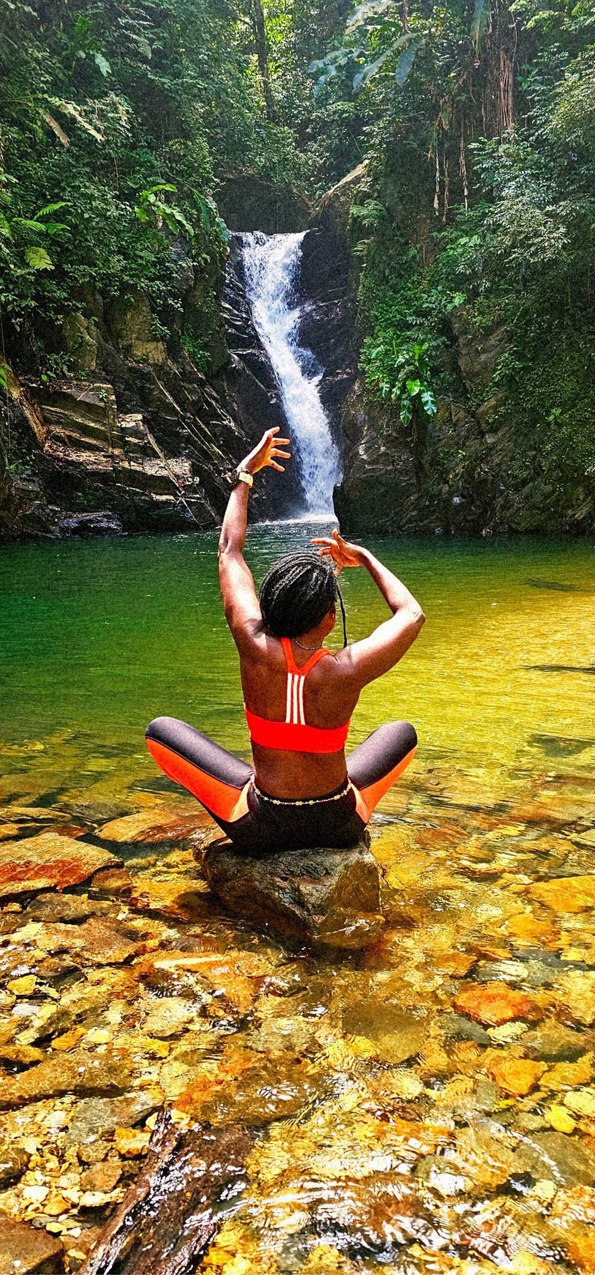 woman wearing yellow long-sleeved dress under white clouds and blue sky during daytime