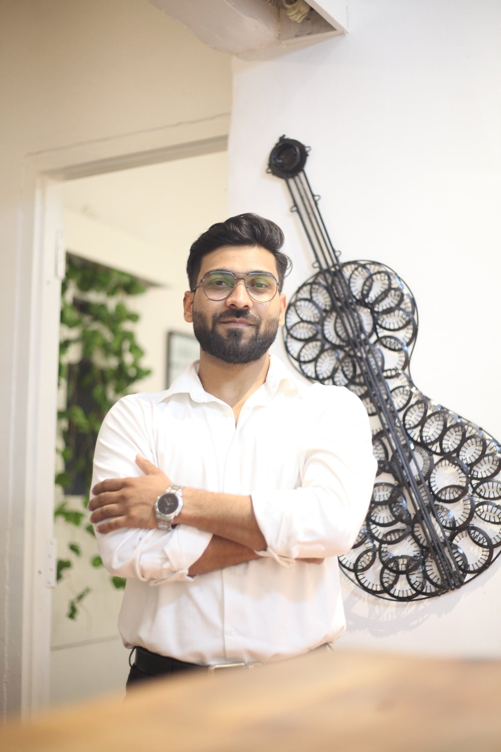 woman wearing yellow long-sleeved dress under white clouds and blue sky during daytime