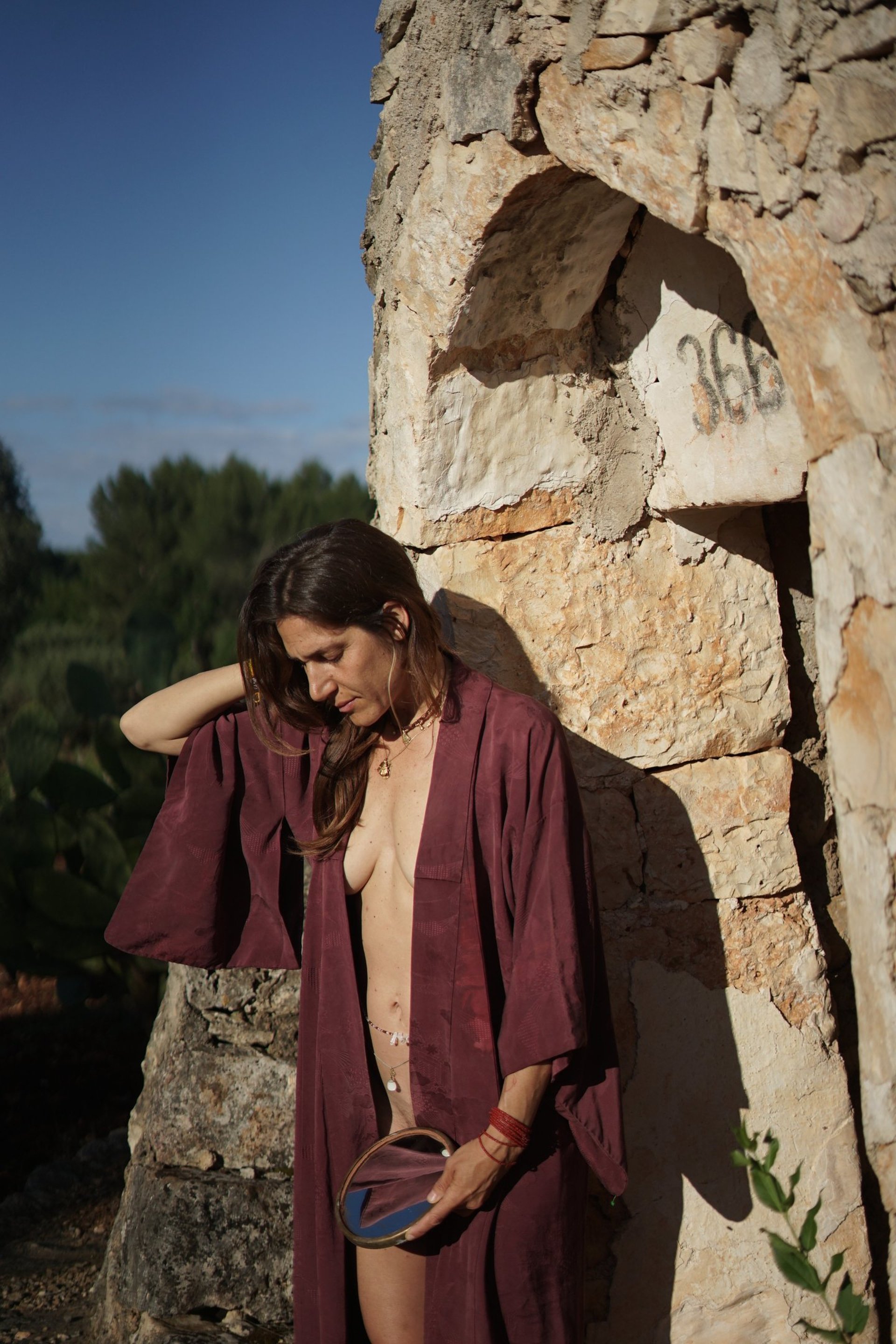 an abstract photo of a curved building with a blue sky in the background