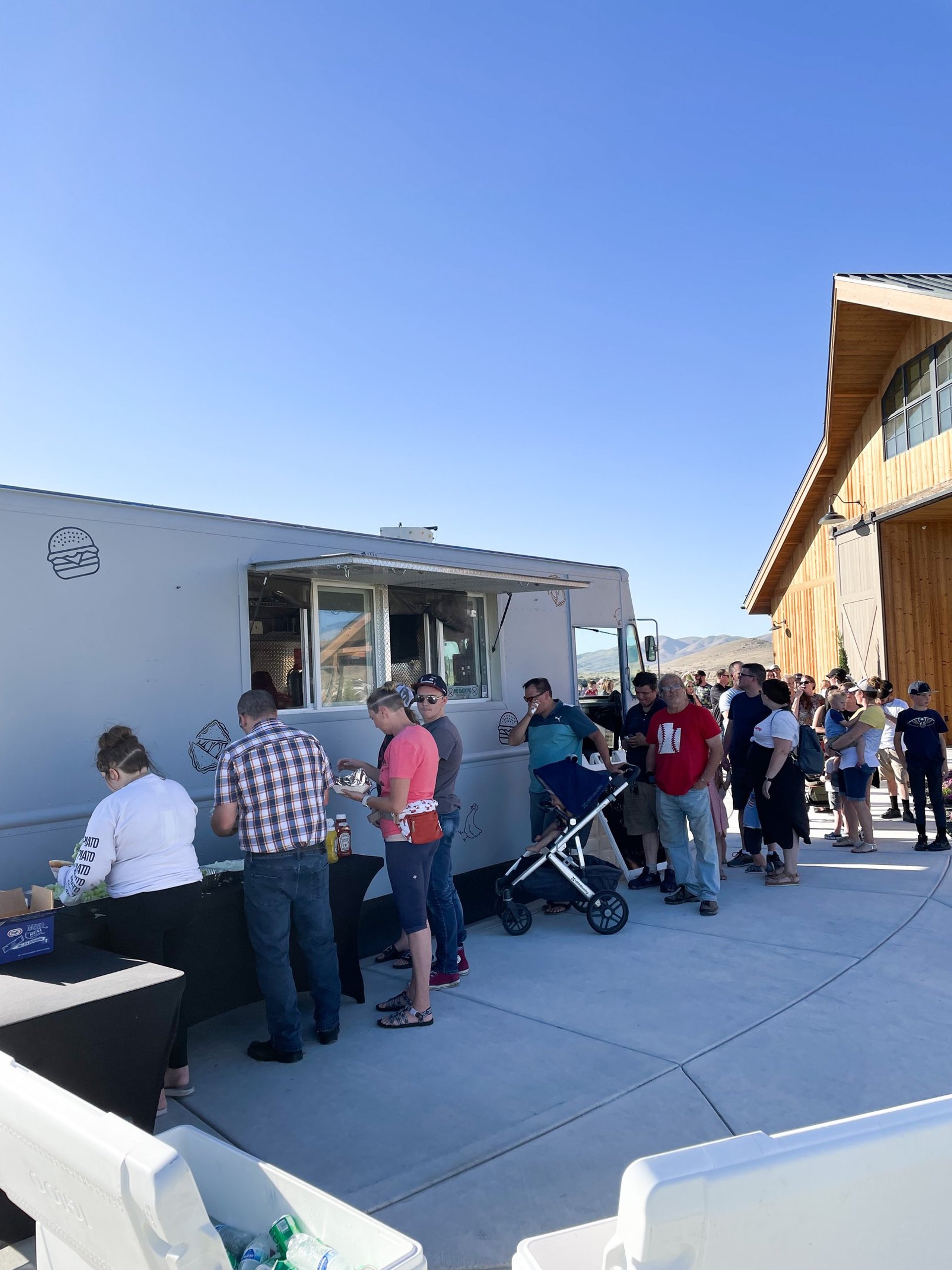 an abstract photo of a curved building with a blue sky in the background