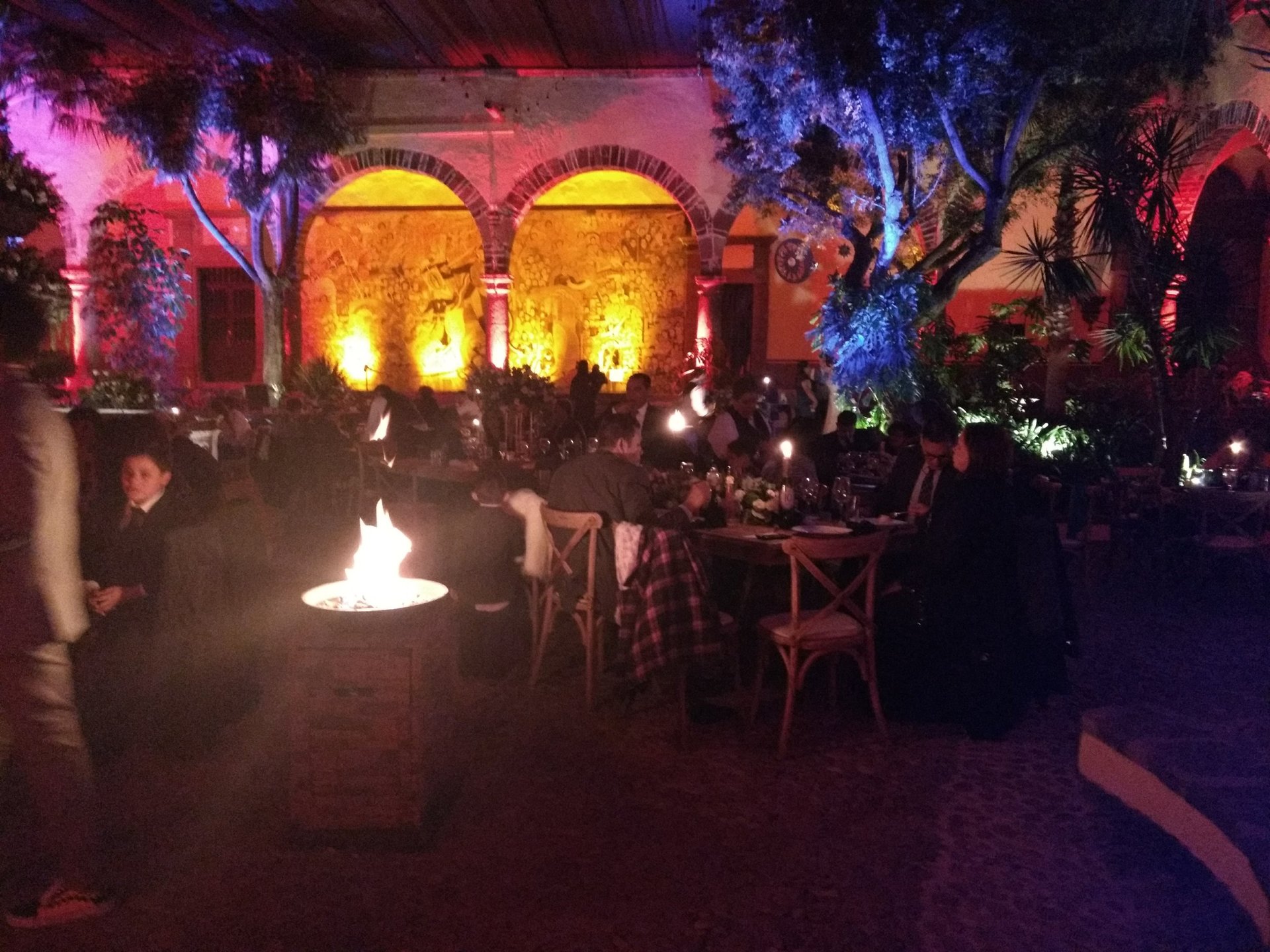 woman wearing yellow long-sleeved dress under white clouds and blue sky during daytime