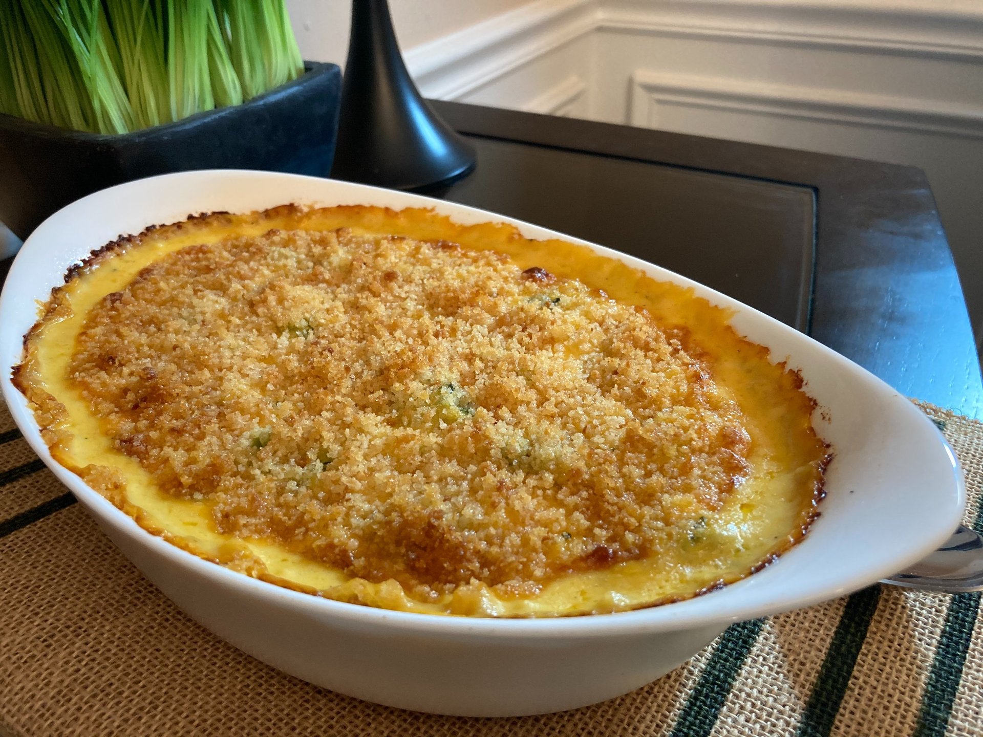 person holding gray cooking pan