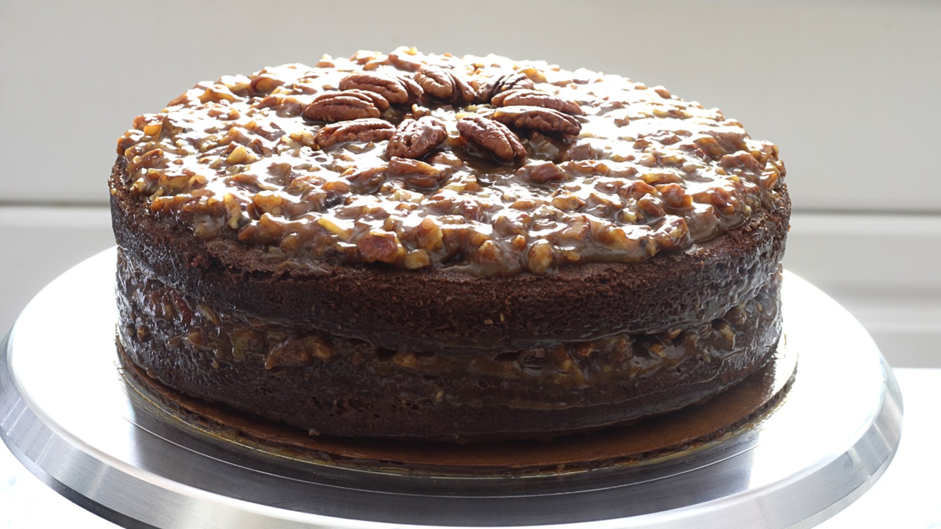 an abstract photo of a curved building with a blue sky in the background