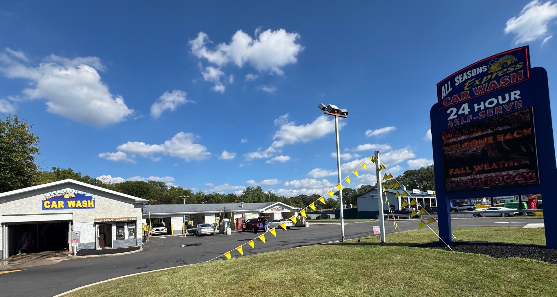 woman wearing yellow long-sleeved dress under white clouds and blue sky during daytime