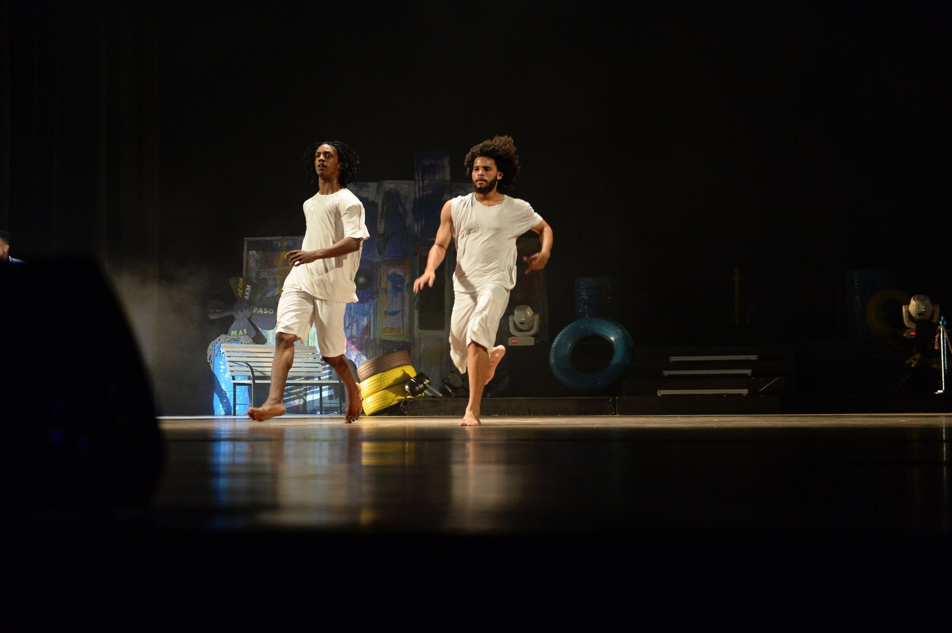 an abstract photo of a curved building with a blue sky in the background