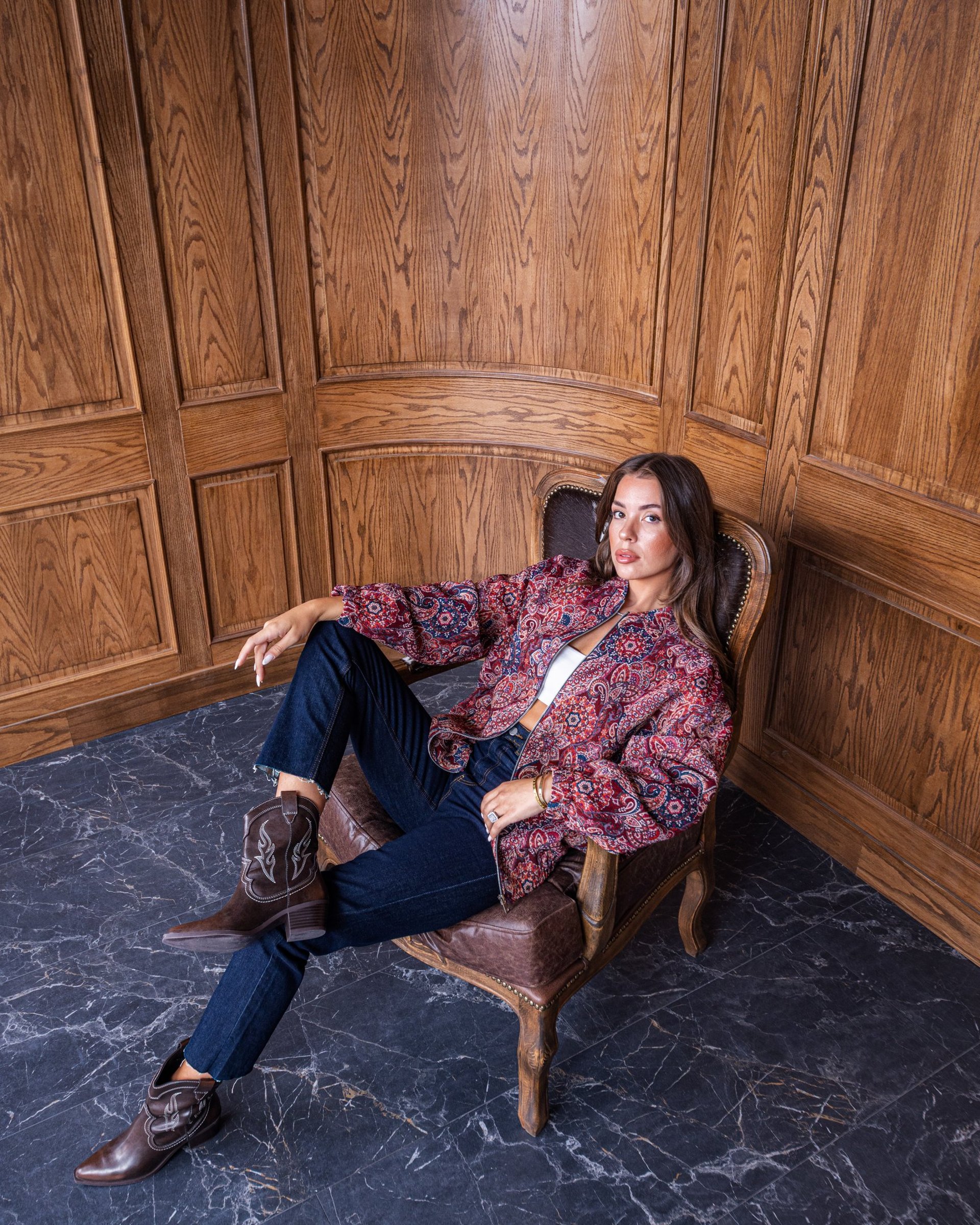 woman in black brassiere holding microphone