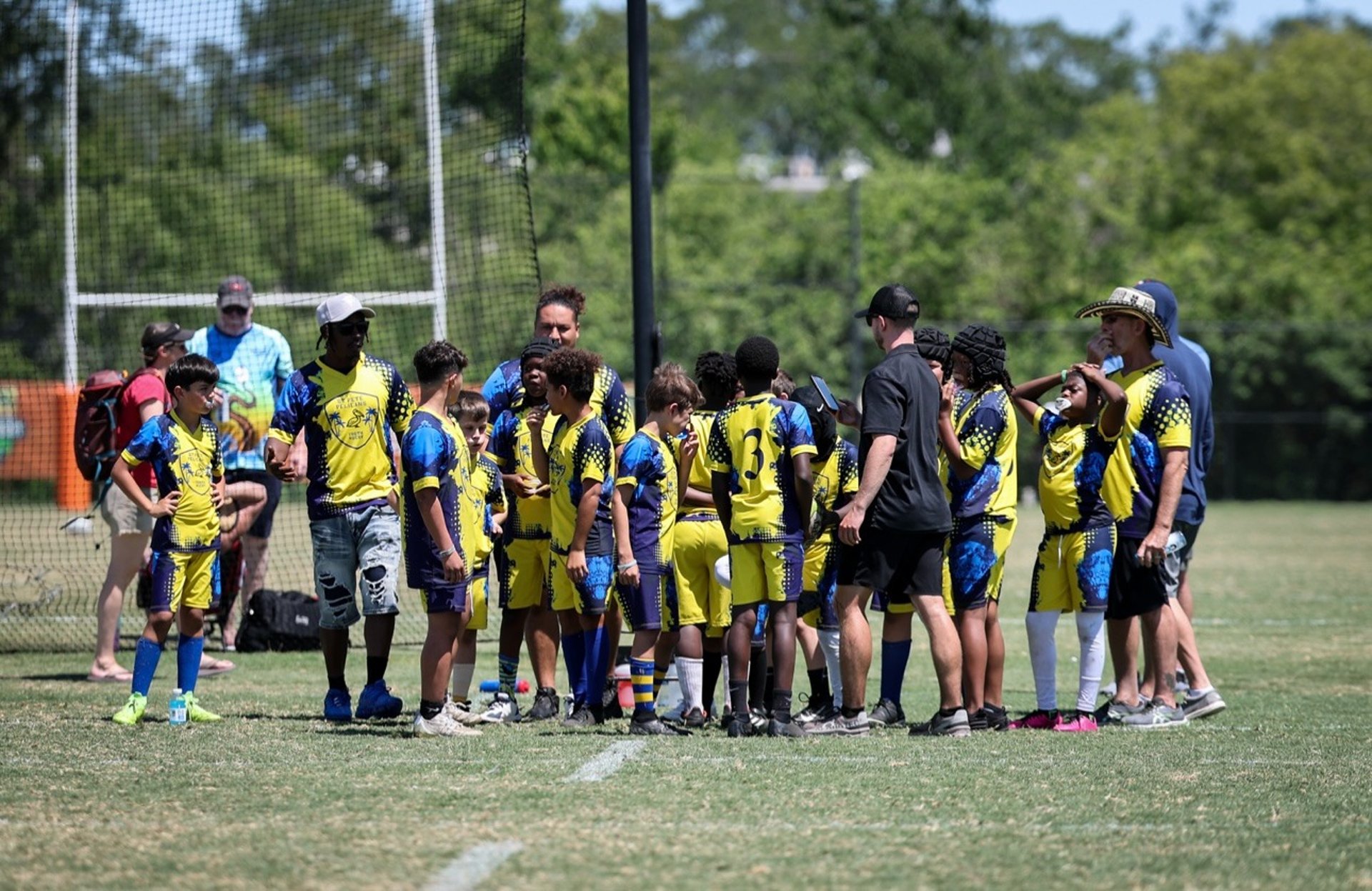 woman wearing yellow long-sleeved dress under white clouds and blue sky during daytime