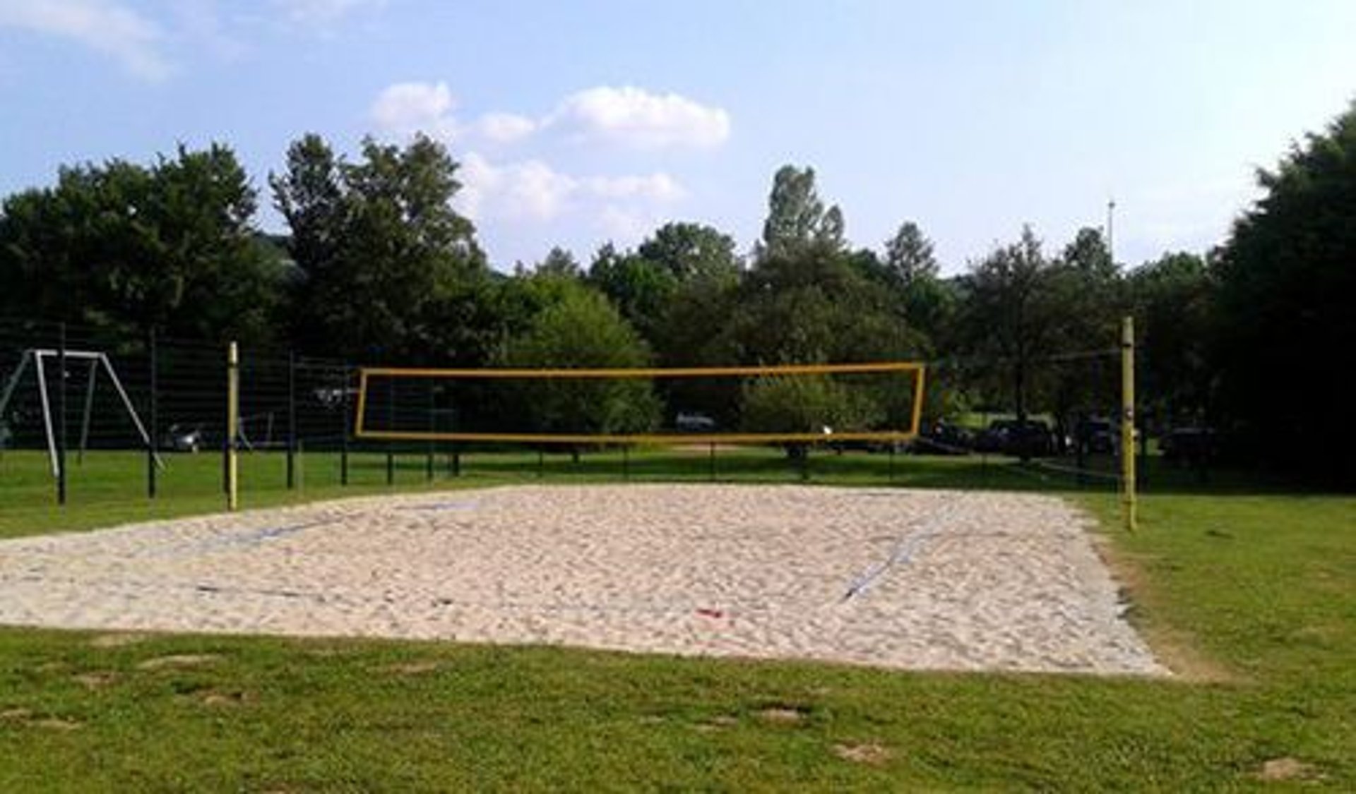 an abstract photo of a curved building with a blue sky in the background