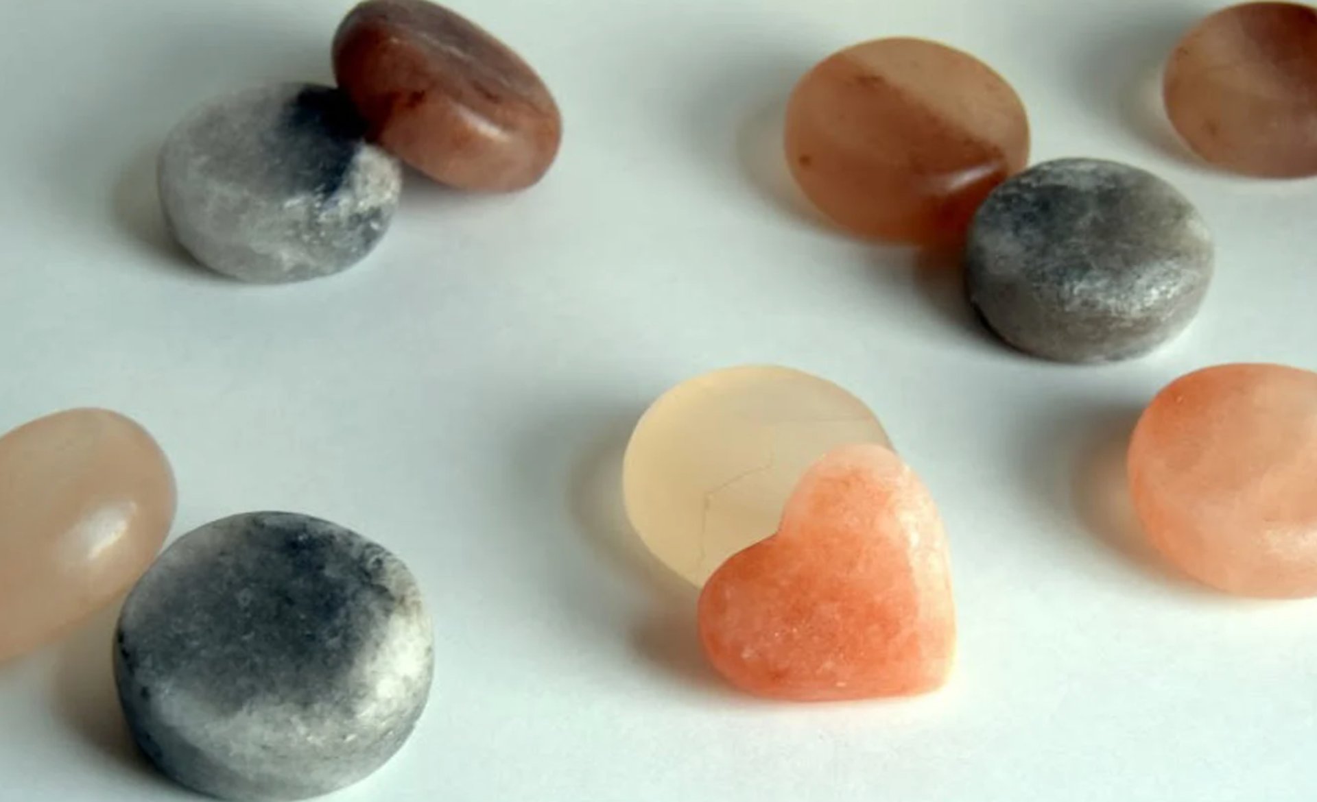 an abstract photo of a curved building with a blue sky in the background