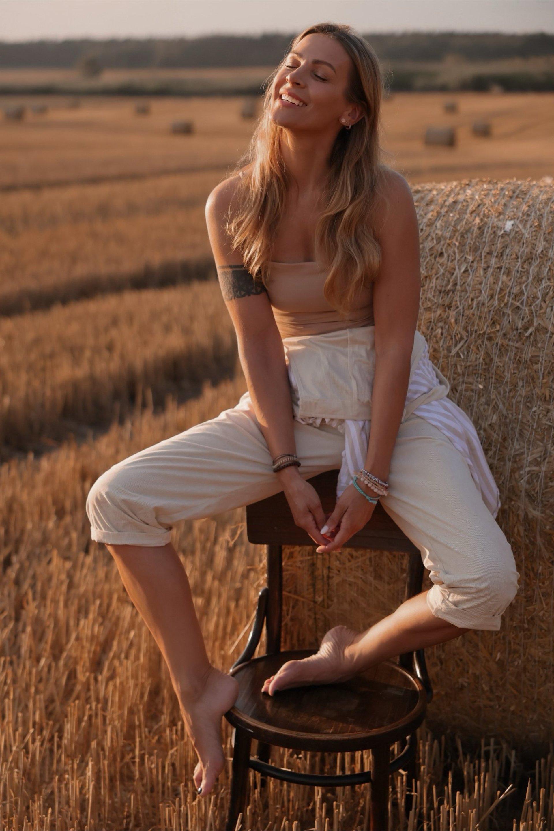 black and brown leather padded tub sofa