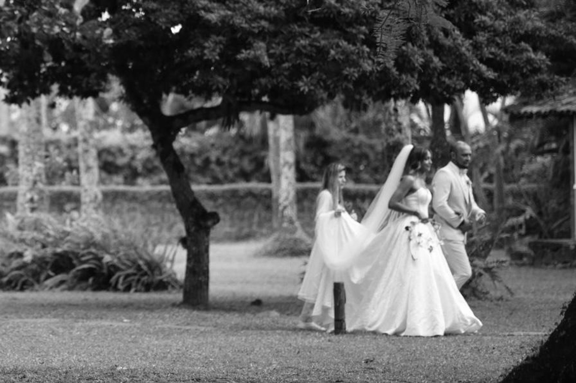 woman wearing yellow long-sleeved dress under white clouds and blue sky during daytime