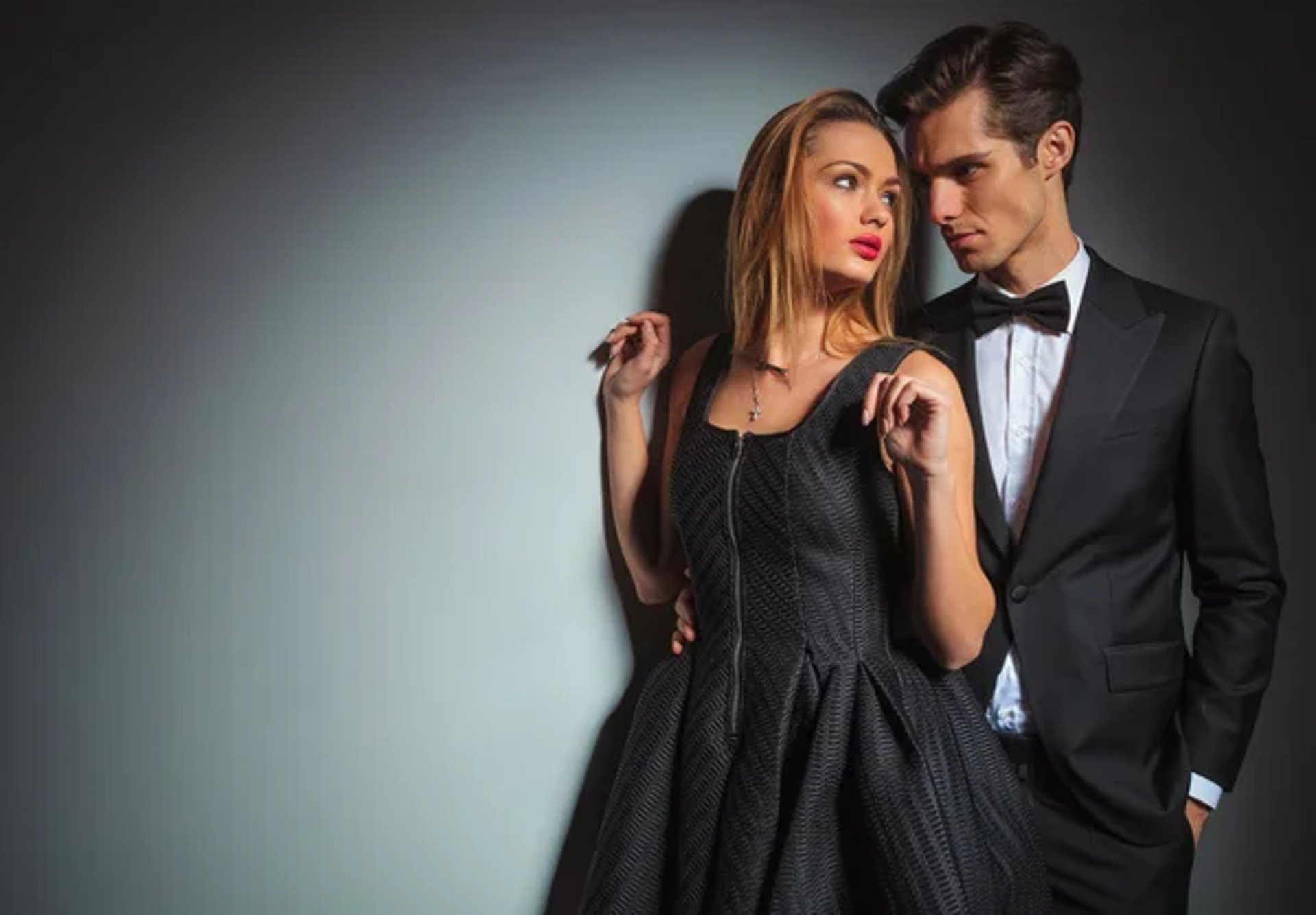 woman wearing yellow long-sleeved dress under white clouds and blue sky during daytime