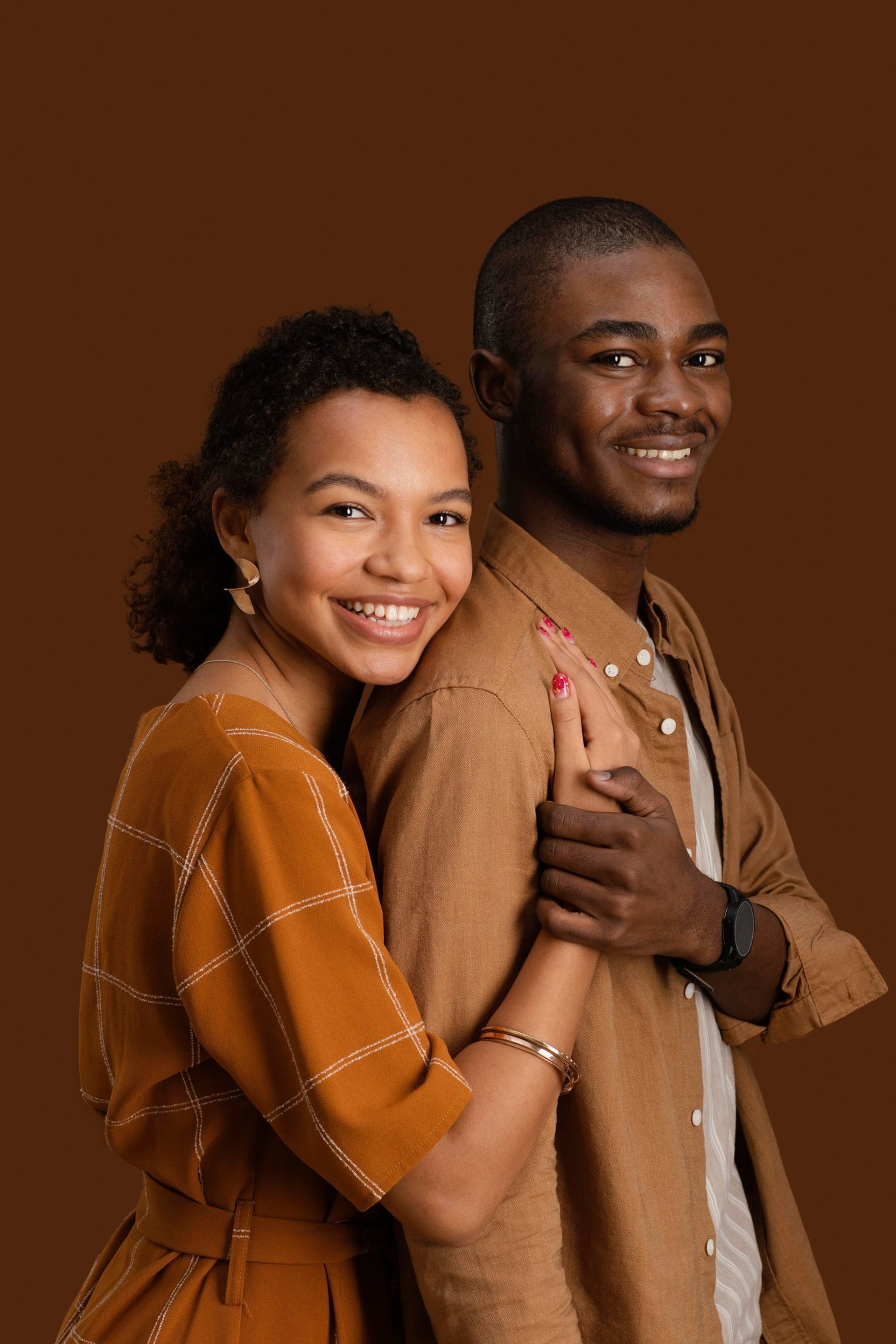 black and brown leather padded tub sofa
