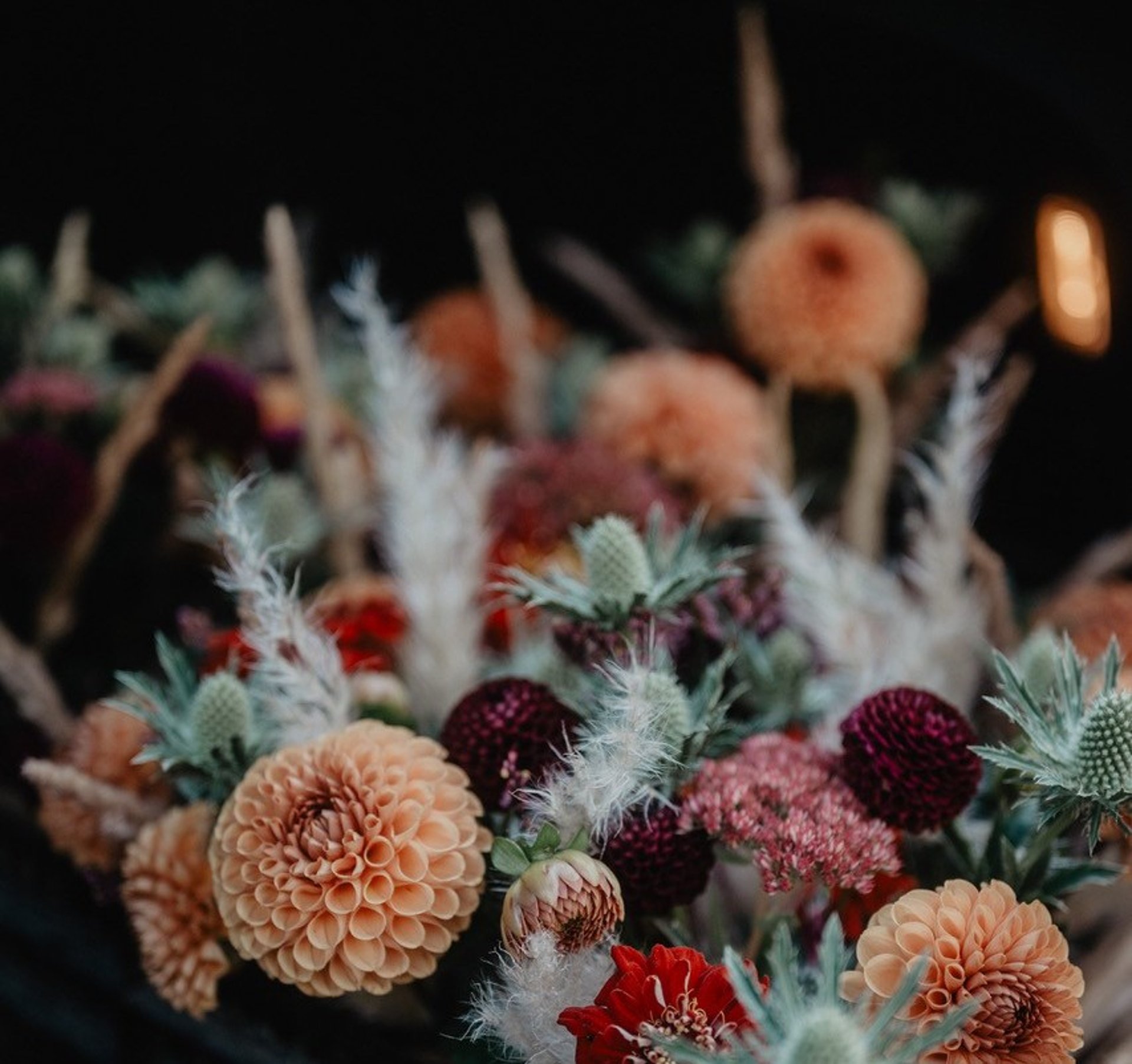 woman wearing yellow long-sleeved dress under white clouds and blue sky during daytime