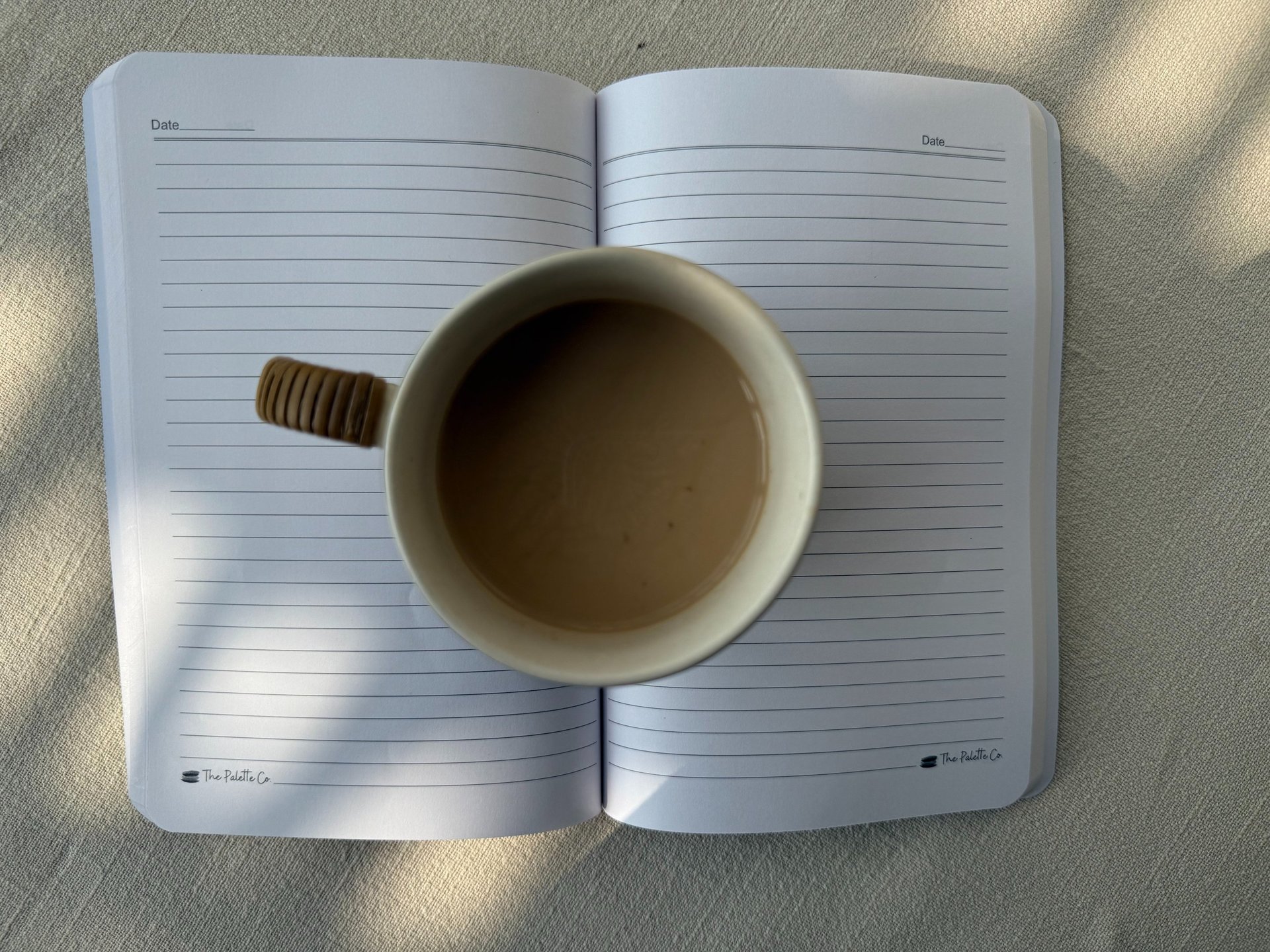 A box of watercolors sitting on top of a table