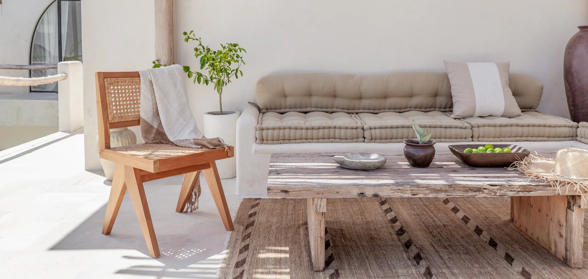 an abstract photo of a curved building with a blue sky in the background